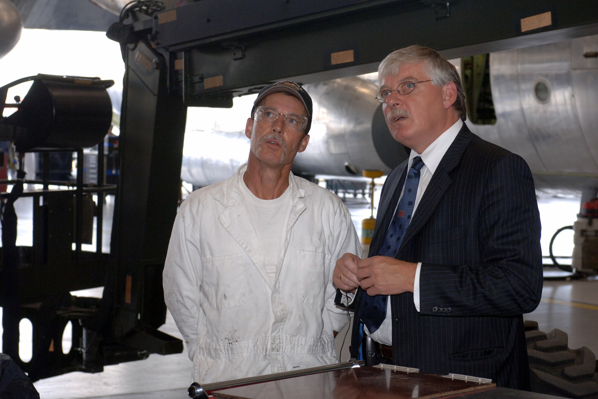 HILL AIR FORCE BASE, Utah-- Kevin Durst, 572nd Aicraft Maintenance Squadron, explains the C-130 modifications process to the Netherlands Minister of Defense, his excellency Cees van der Knaap, during a recent visit to Hill Air Force Base, Utah. (U.S. Air Force photo by Alex R. Lloyd)