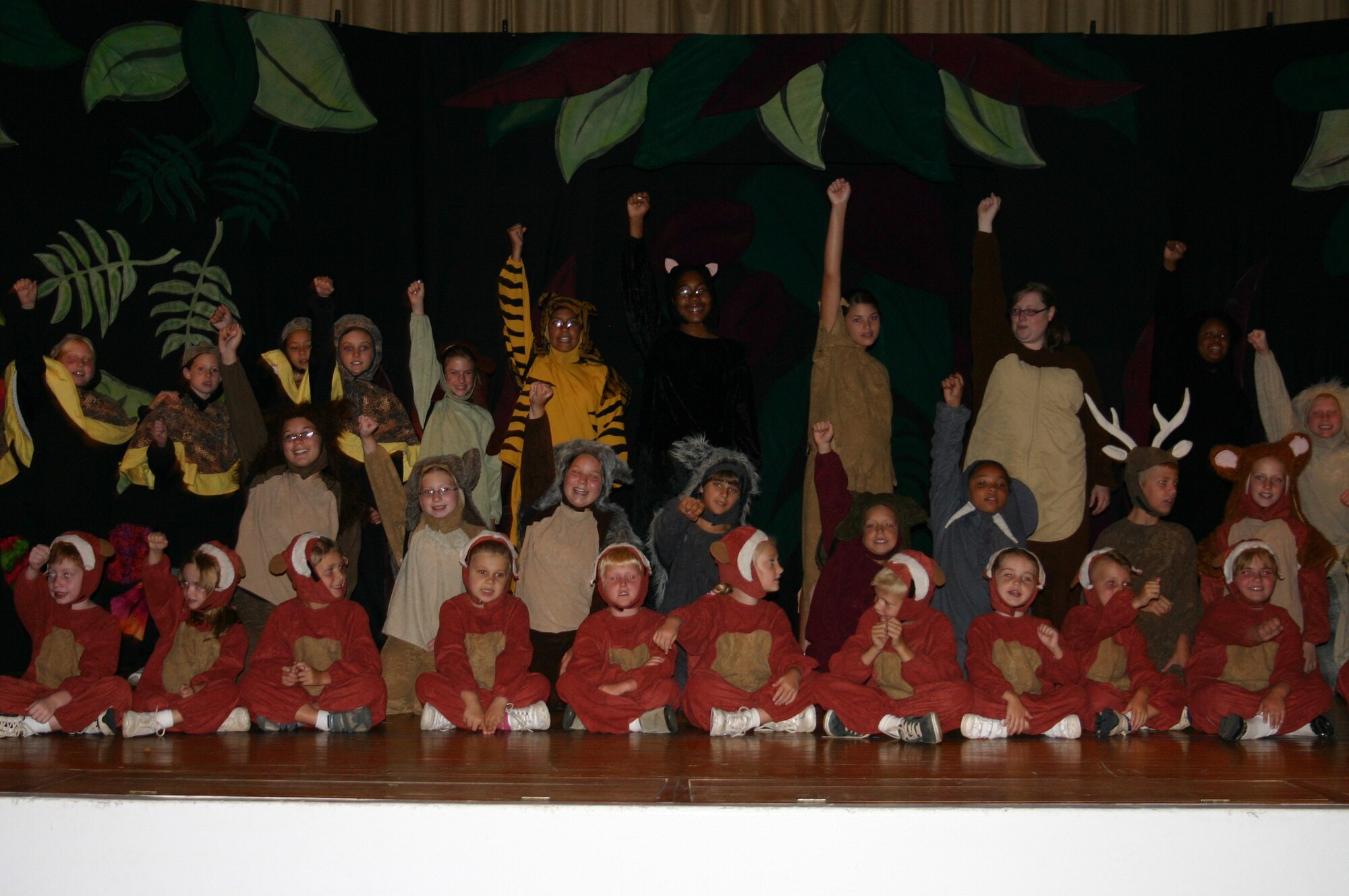 The cast of "The Jungle Book" performs the final scene during a dress rehearsal. The Missoula Children's Theatre presented the play at the base theater here July 14. (U.S. Air Force photo by Airman Elliott Sprehe)