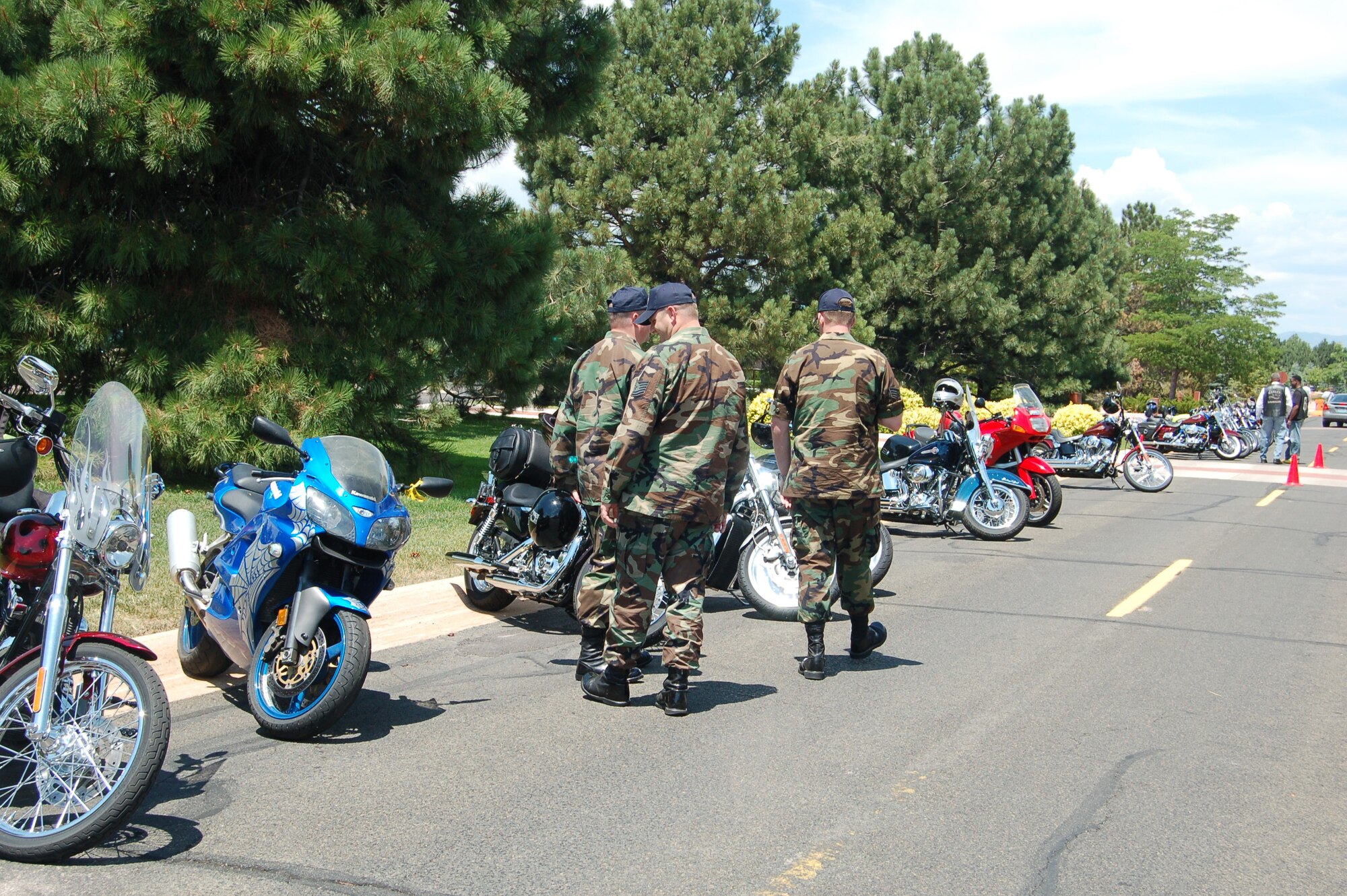 Airmen check out some of the many motorcycles on display July 13 during Peterson’s motorcycle rally. There was safety tips, games, music, food and more offered during the event. (U.S. Air Force photo by Corey Dahl)