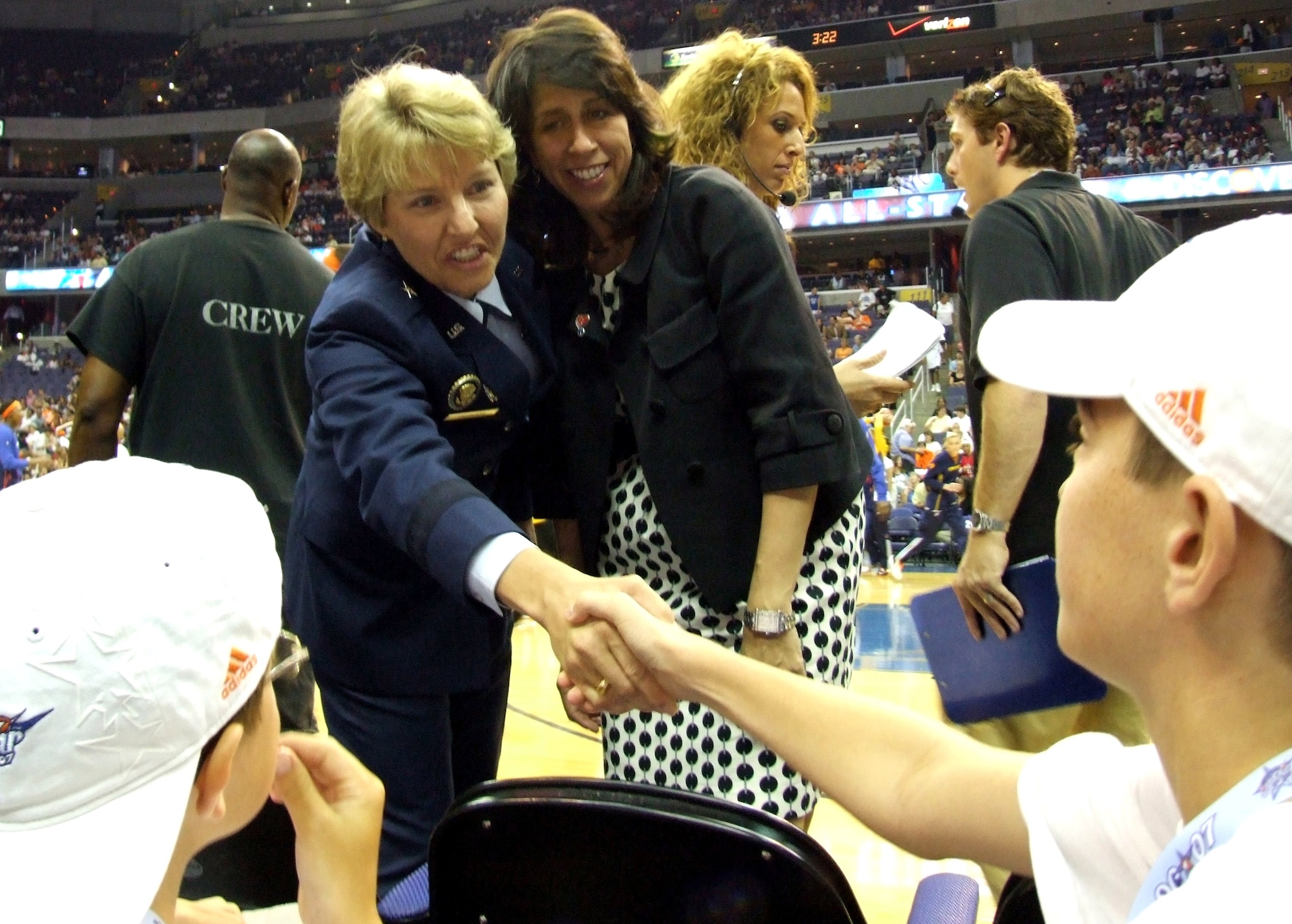 WNBA President Donna Orender (right) and Brig. Gen. Michelle D. Johnson, the director of Air Force Public Affairs, greet people at the Women's National Basketball Association's annual All-Star Game held July 15 at the Verizon Center in Washington, D.C. (Defense Department photo/Gerry J. Gilmore)
