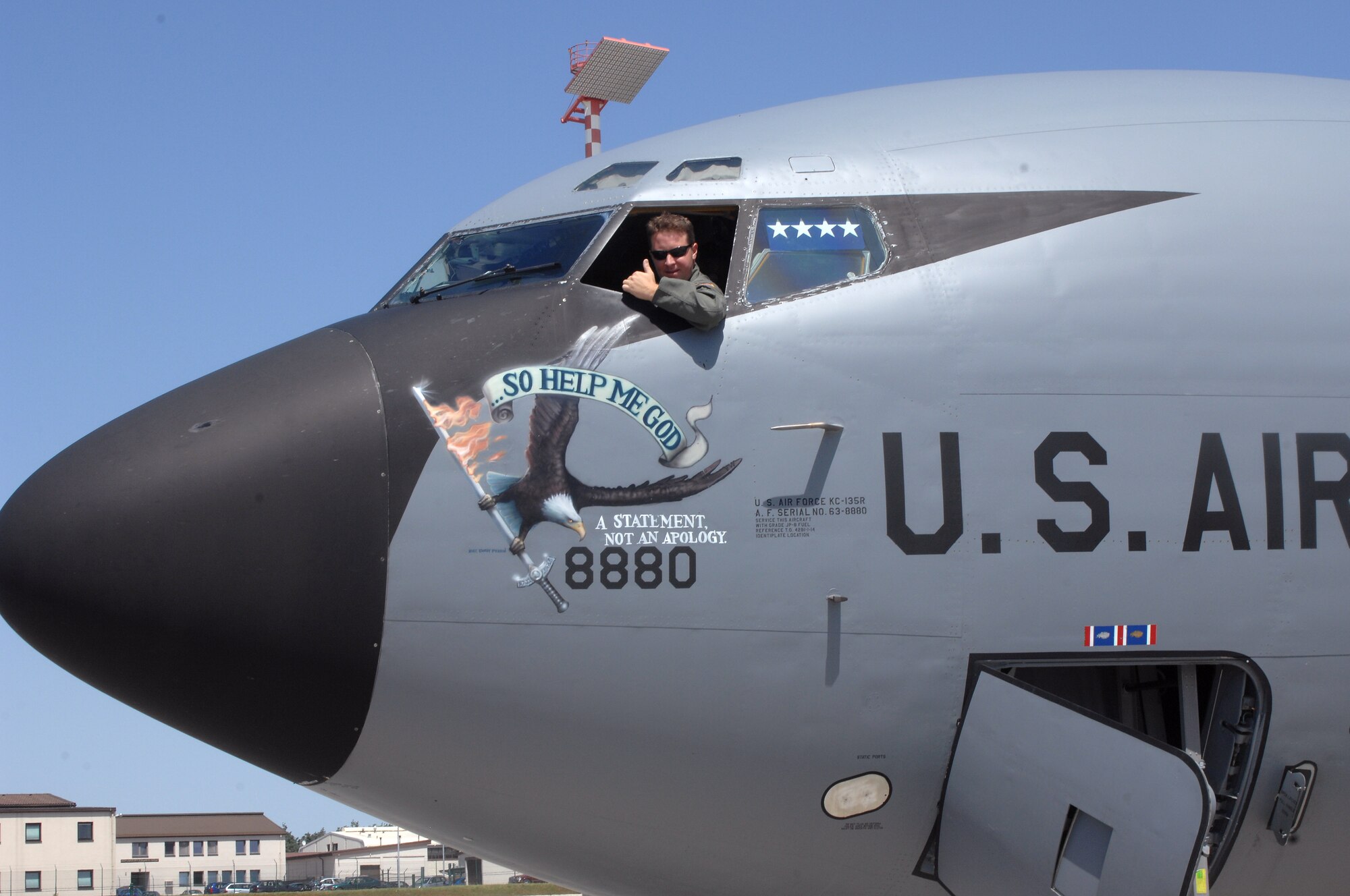 A member of General Kevin Chilton's air crew gives a thumbs up, signaling that the crew is ready for take of before departing Ramstein Air Base July 16, 2007. General Chilton visited U.S. Air Forces in Europe to visit Airmen who work in all space command detachments and boost morale. (U.S. Air Force photo/Airman 1st Class Kenny Holston)