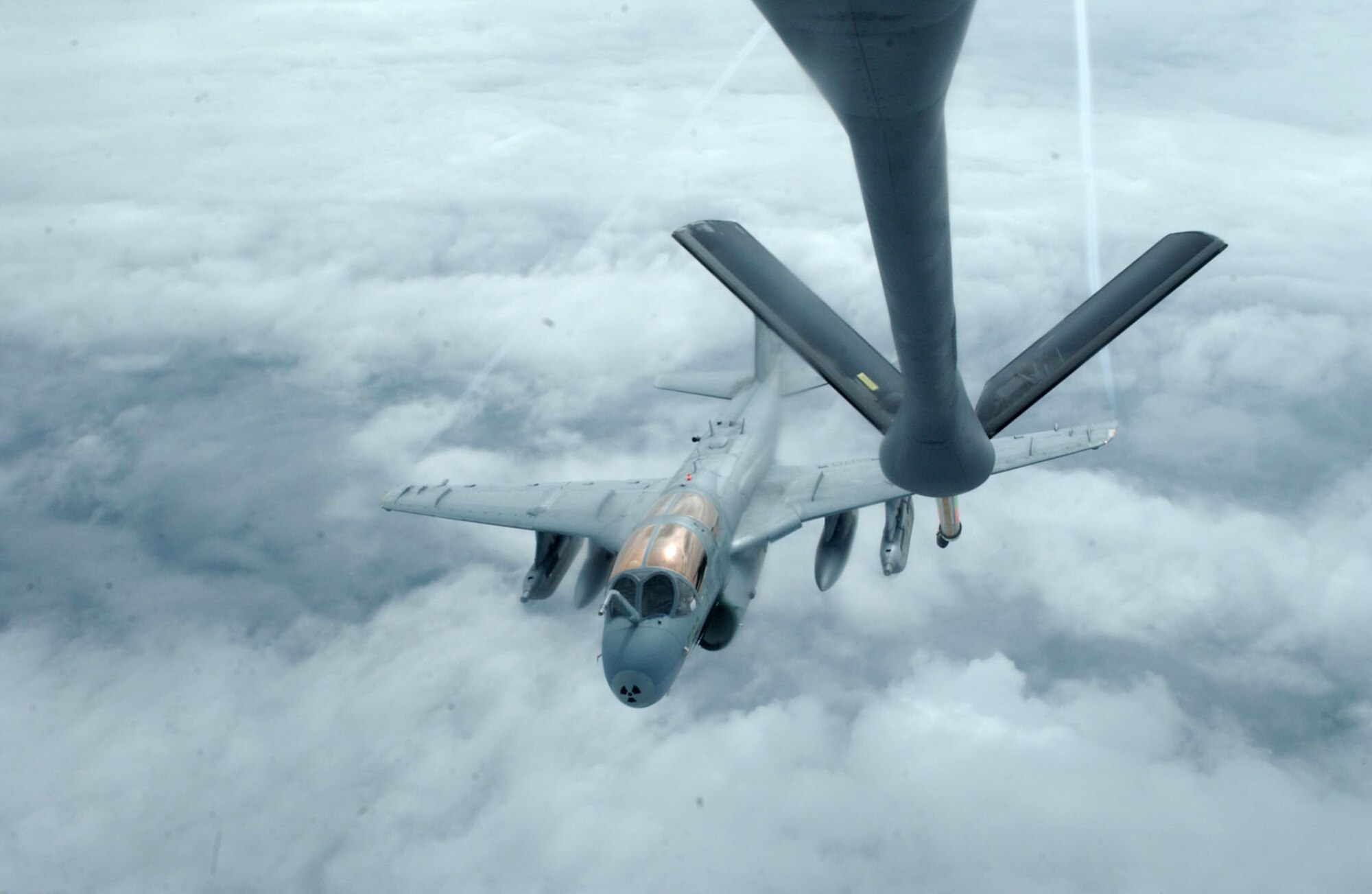 EIELSON AIR FORCE BASE, Alaska -- A Navy EA-6B Prowler of the Electronic Attack Squadron 209, Washington D.C. refuels from a KC-135 over the Pacific Alaskan Range Complex during Red Flag Alaska based at Eielson AFB, Alaska July 17, 2007. This exercise provides training for units preparing for air expeditionary force taskings. International partners include Japan, Mongolia, Spain, Thailand, Turkey and NATO.   (U.S. Air Force photo by Capt. Tana R.H. Stevenson)                                 