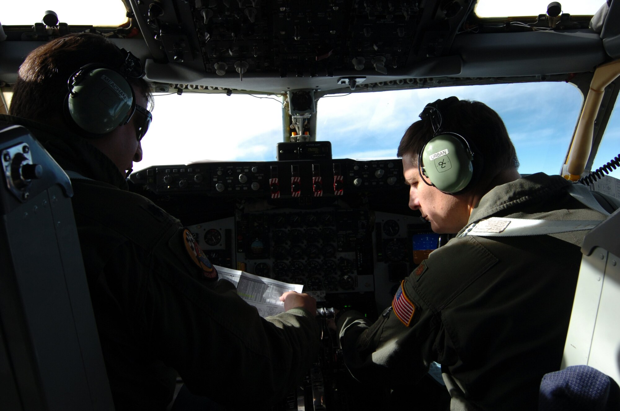 EIELSON AIR FORCE BASE, Alaska -- Lt. Col. Meacham (L) and Maj. Urban (R), 63 Air Refueling Squadron, Selfridge ANG Base, MI., prepare to land after a refueling mission. Colonel Meacham and Maj. Urban refueled seven F-15's from Elmendorf AFB, AK., participating in Red Flag-Alaska 07-3. (U.S. Air Force photo by MSgt Brandt Smith) (Released)