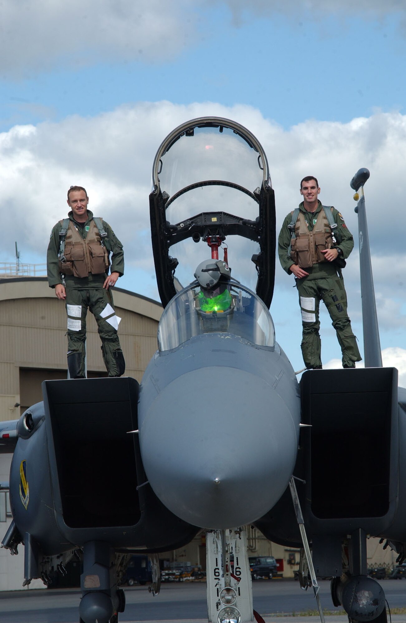 EIELSON AIR FORCE BASE, Alaska -- Capt Saul Horner (R), and Capt Mark Crawford, 335th Fighter Squadron, Seymour Johnson, N.C., prepare for an allied flight with Turkish and Spanish aviators at Red Flag Alaska July 16, 2007.  This exercise provides unique opportunities to help integrate various forces into joint, coalition, and bilateral training from simulated forward operating bases.  (U.S. Air Force photo by Capt. Tana R.H. Stevenson) 