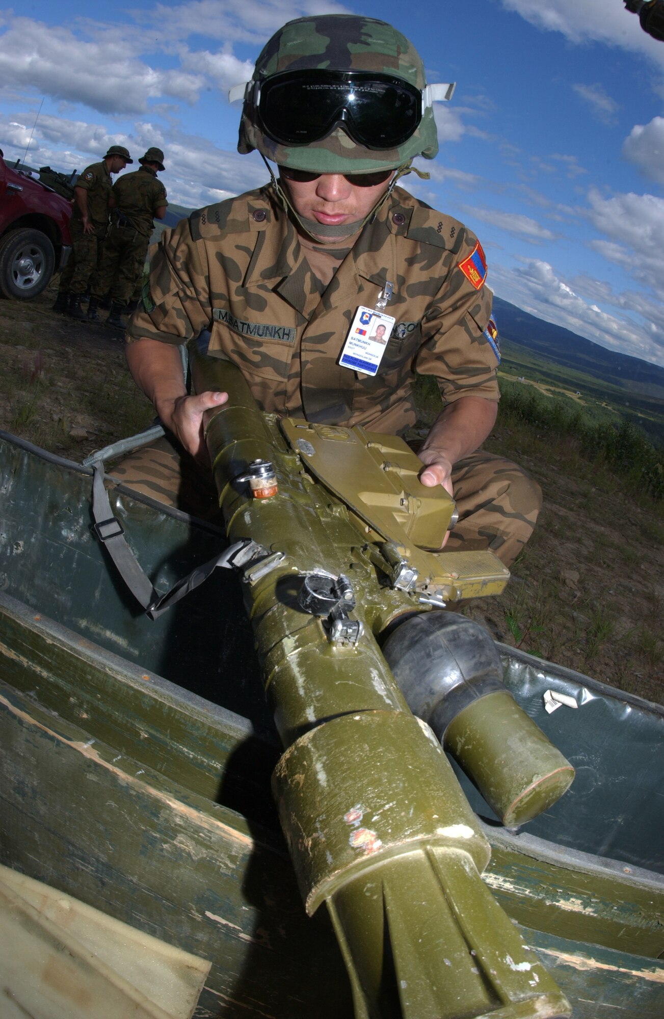 EIELSON AIR FORCE BASE, Alaska -- Staff Sgt. Munkhuu Batmunkh, Mongolian Air Defense Force, assembles an SA-7 Man-portable air-defense systems (surface to air missile launcher) on the Pacific Alaskan Range Complex on July 16 during Red Flag-Alaska 07-3. The PARC provides 67,000 square miles of airspace, one conventional bombing range and two tactical bombing ranges containing more than 400 different types of targets and more than 30 threat simulators which allows them to exchange tactics, techniques, and procedures and improve interoperability. (U.S. Air Force Photo by Airman 1st Class Jonathan Snyder) 