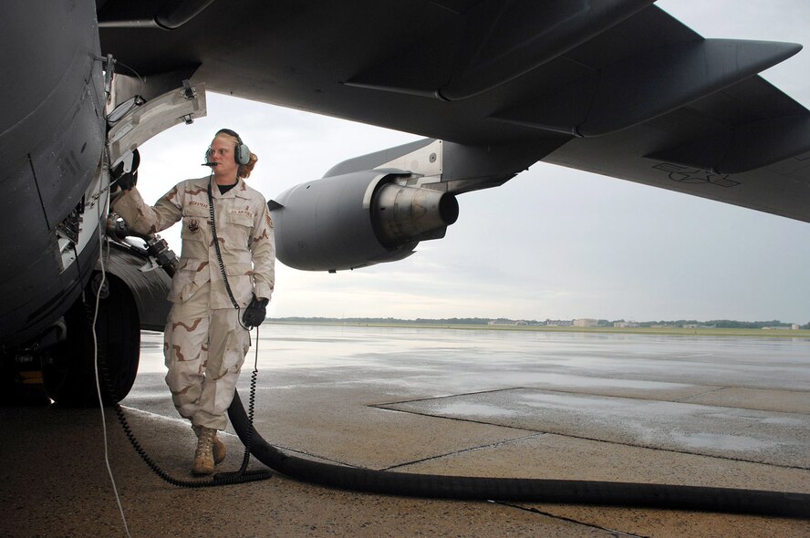 March Air Reserve Base Airman's photo featured in last month’s airpower summary.  Staff Sgt. Angie Beckstead refuels a C-17 Globemaster III aircraft at Andrews Air Force Base, Md., June 12, 2007. Coalition C-17s and C-130s provide airlift throughout the area of responsibility. The aircraft moved 1,556 people and over 400 tons of supplies July 17. Sergeant Beckstead is a crew chief from the 452nd Maintenance Squadron. (U.S. Air Force photo/Tech. Sgt. Rick Sforza) 
