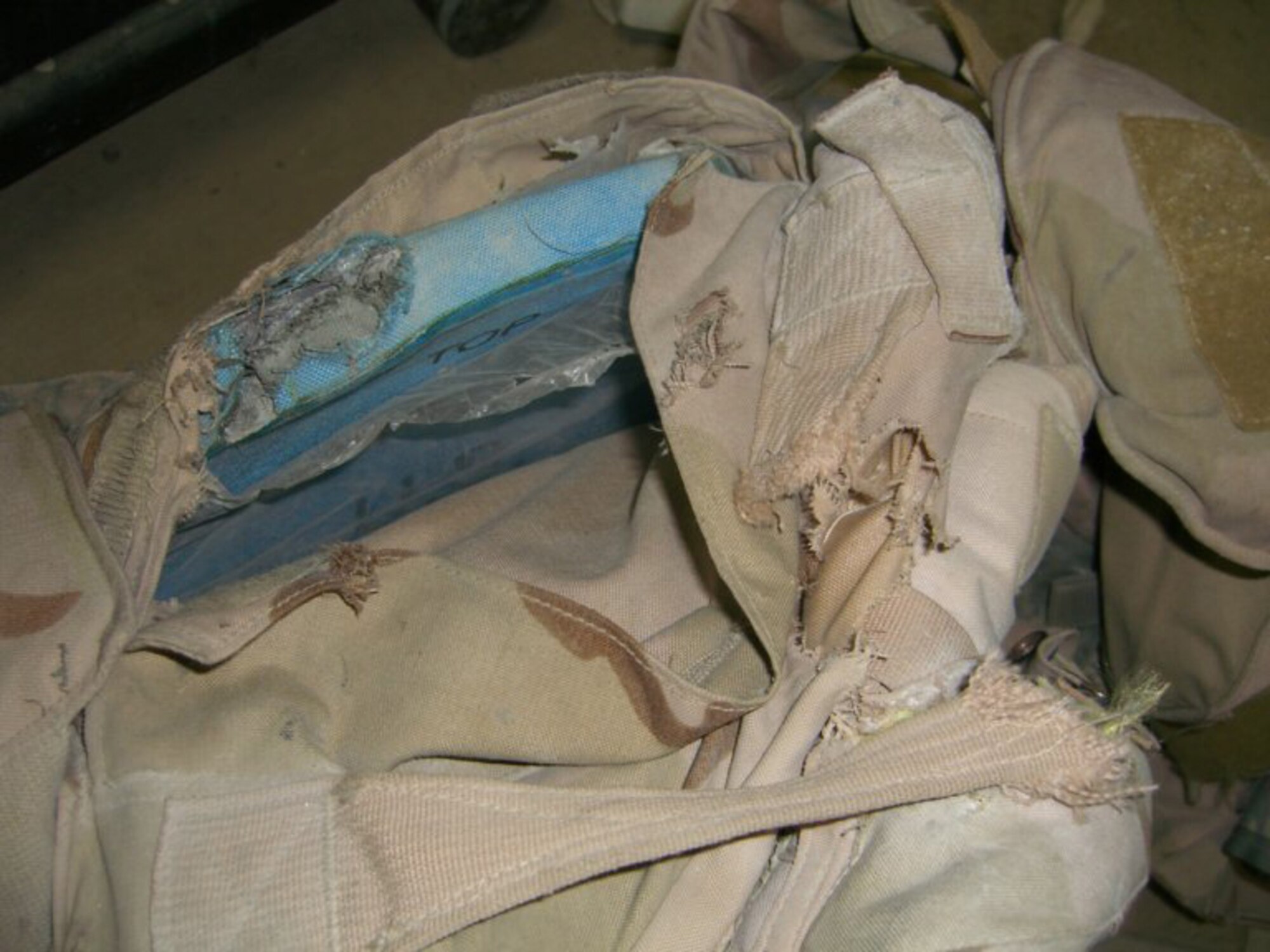 Shown here is the vest Senior Airman Shawn Ryan, 82nd Security Forces Squadron, was wearing when his convoy encountered an improvised explosive device outside Baghdad, Iraq. Airman Ryan recieved the Purple Heart for injuries sustained while deployed to Iraq July 16 at the Sheppard Club. (U.S. Air Force photo)