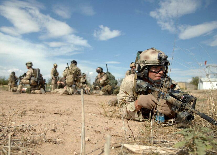 Senior Airman David Covel maintains security during a training scenario July 13 at Playas, N.M., that is part of Exercise Angel Thunder 2007.  Angel Thunder is a combat search and rescue task force exercise designed to test theater spin-up capabilities and examine the integration of all Air Force assets in mission planning procedures and mission execution.  Airman Covel is a pararescueman from the 58th Rescue Squadron at Nellis Air Force Base, Nev.  (U.S. Air Force photo/Senior Airman Christina D. Ponte)