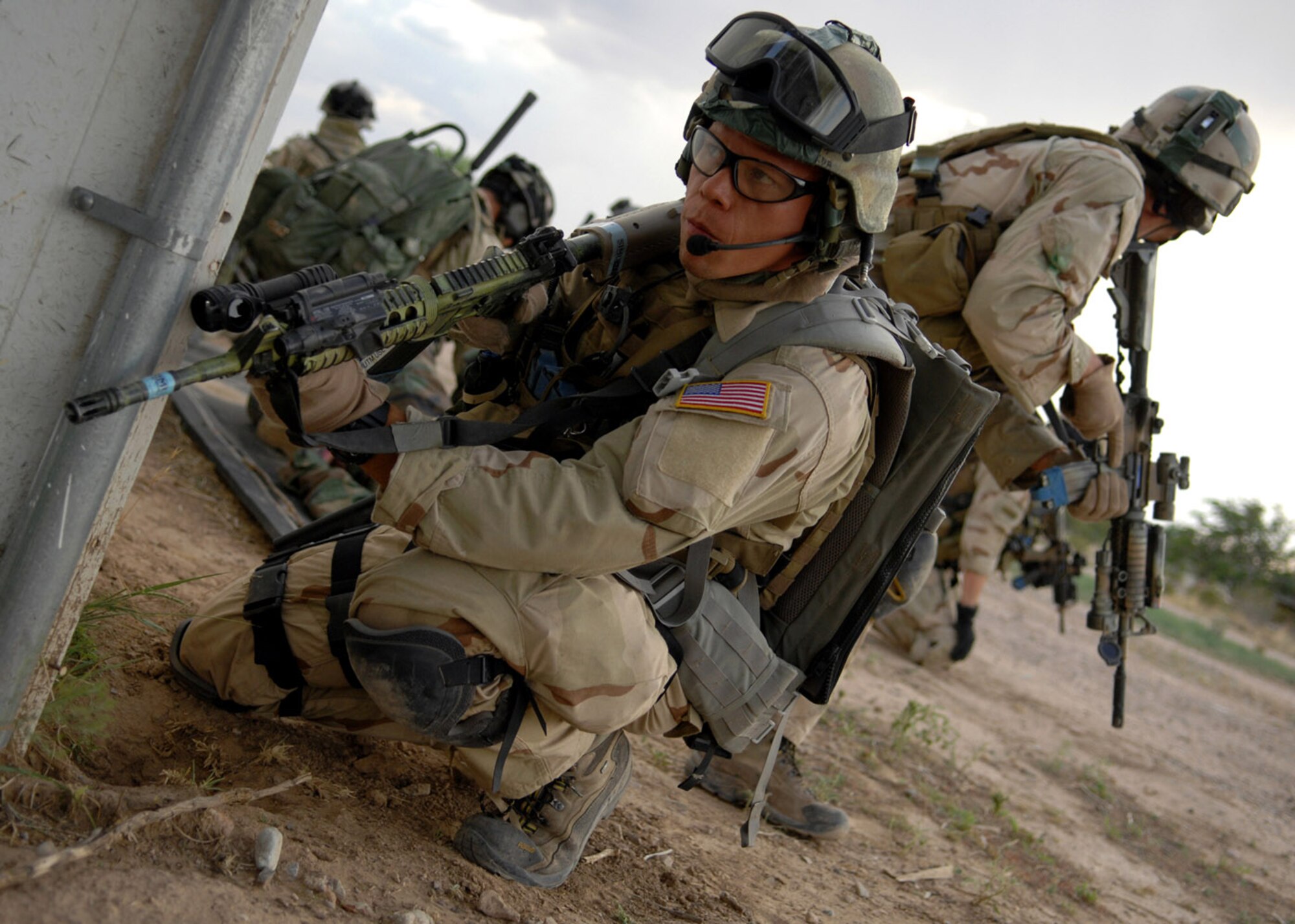Tech. Sgt. Kristopher Burridge maintains security during a training scenario July 13 at Playas, N.M., that is part of Exercise Angel Thunder 2007.  Angel Thunder is a combat search and rescue task force exercise designed to test theater spin-up capabilities and examine the integration of all Air Force assets in mission planning procedures and mission execution.  Sergeant Burridge is a pararescueman from the 38th Rescue Squadron at Moody Air Force Base, Ga.  (U.S. Air Force photo/Airman 1st Class Alesia Goosic)