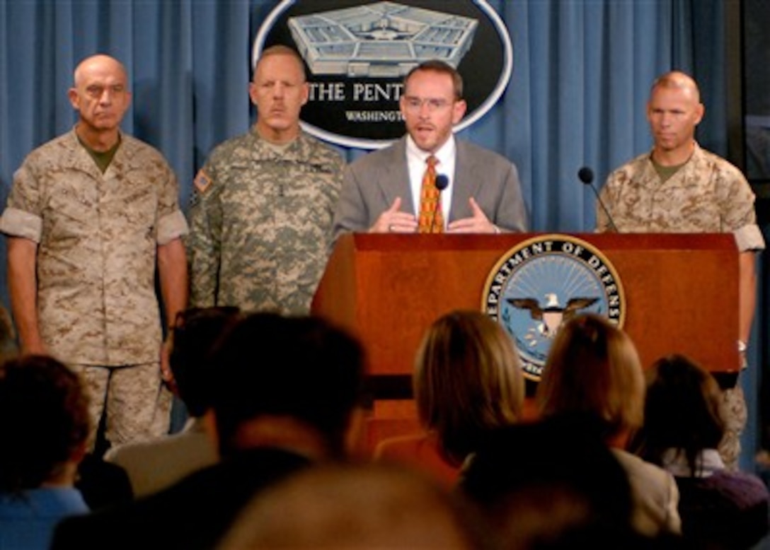 Chairman of the Mine Resistant Ambush Protected Vehicle Task Force John Young (center) answers a reporter's question during a press conference on the accelerated procurement of the specialized vehicles in the Pentagon on July 18, 2007.  Deputy Commandant of the Marine Corps for Programs and Resources Lt. Gen. John Castellaw (left), Deputy Chief of Staff Army G8 Lt. Gen. Stephen Speakes (2nd from left), and Commander, Marine Corps Systems Command Brig. Gen. Michael Brogan (right) joined Young at the press conference.  