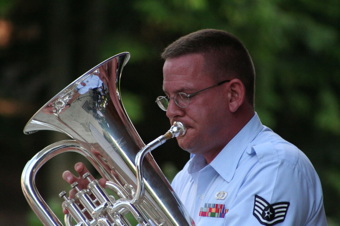 SSgt Dan Bentley performs on the euphonium in Westerville, OH in July 2007.  His performed a medley of american melodies in a piece of music entitled "An American Portrait."
