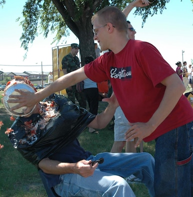 A Malmstrom Warrior gets a pie in the face during last year's Pie in the Face contest. (U.S. Air Force photo / Valerie Mullett)