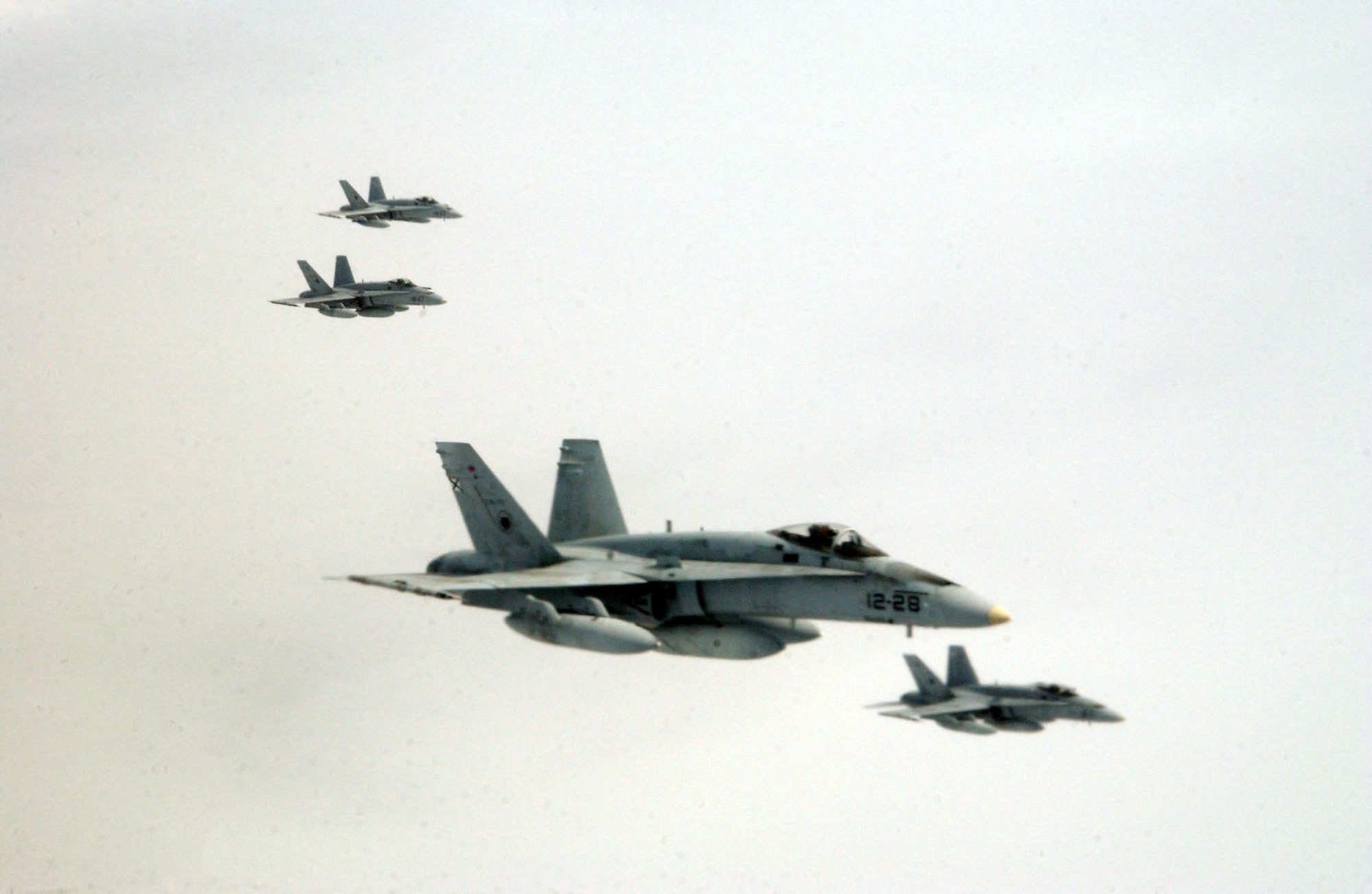 EIELSON AIR FORCE BASE, Alaska -- Spanish F/A-18 Hornets await access to a KC-135 refueler over the Pacific Alaskan Range Complex during Red Flag Alaska based at Eielson AFB, Alaska July 17, 2007. This exercise provides training for units preparing for air expeditionary force taskings. Other International partners include Japan, Mongolia, Thailand, Turkey and NATO.   (U.S. Air Force photo by Capt. Tana R.H. Stevenson)                                      