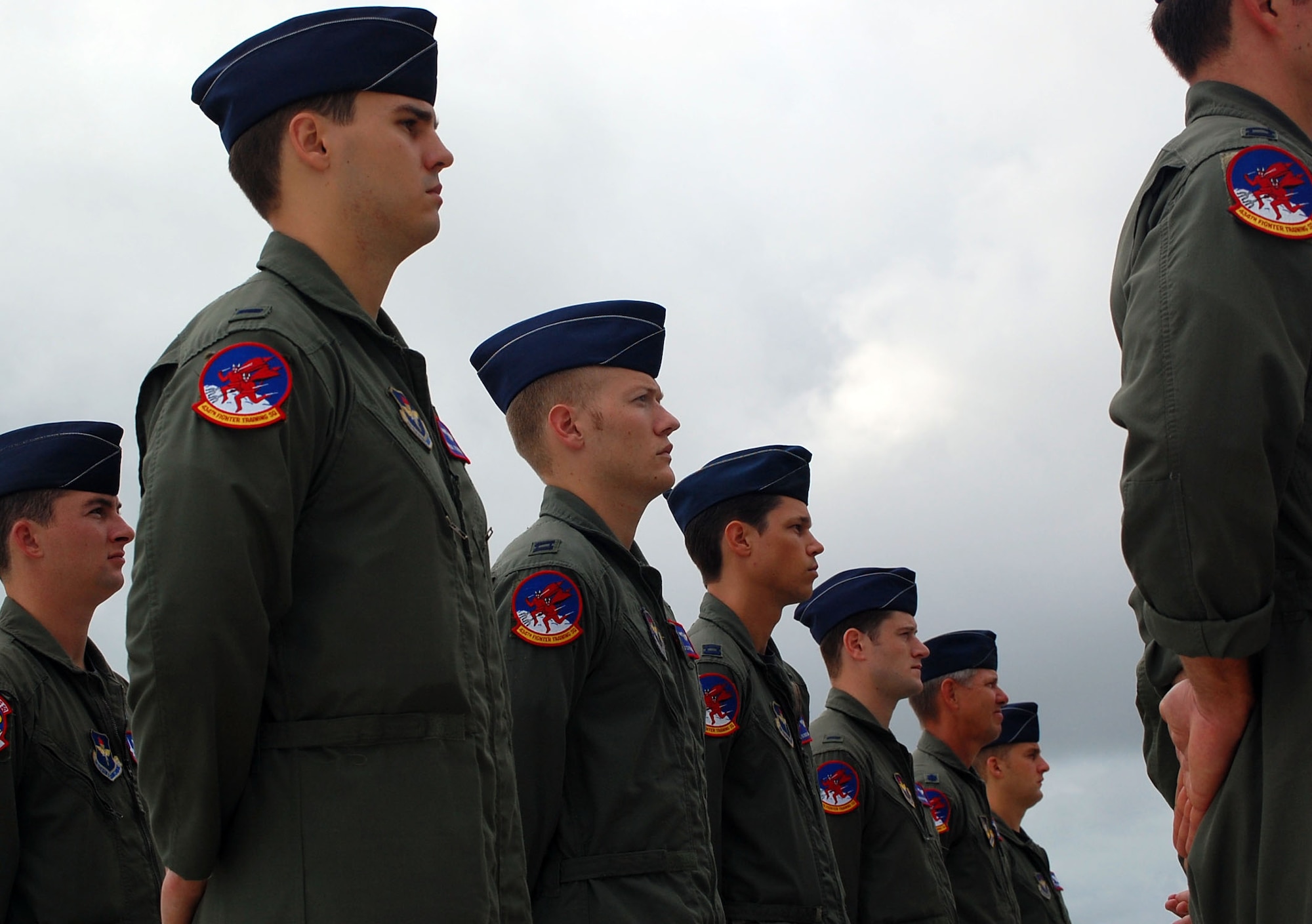 LAUGHLIN AIR FORCE BASE, Texas - Specialized Undergraduate Pilot Training graduates stand at parade rest during the reactivation ceremony of their newly assigned 434th Fighter Training Squadron. Laughlin's newest squadron will teach the recently graduated pilots fighter fundamentals in the T-38C. (U.S. Air Force photo by Airman Sara Csurilla)

