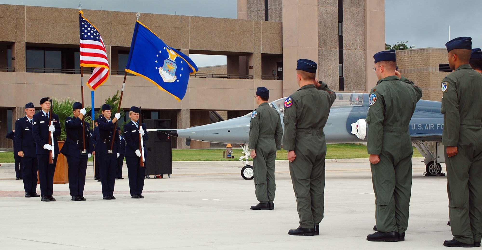 LAUGHLIN AIR FORCE BASE, Texas -- Laughlin's Honor Guard holds the American flag and U.S. Air Force flag for the playing of the National Anthem during the reactivation ceremony of the 434th Fighter Training Squadron July 19.(U.S. Air Force photo by Airman Sara Csurilla)

