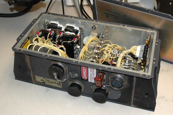 This inoperational HH-60 helicopter weapons control unit was categorized irreparable and placed in bin of items to be shipped to the Defense Reutilization and Marketing Office. When AFREP supply technician Todd Zickel found out the $27,000 part was about to be scrapped, he brought it to the AFREP maintainers. They promptly fixed it -- with components that cost $1.50. (U.S. Air Force Photo/Staff Sgt. Jake Richmond)