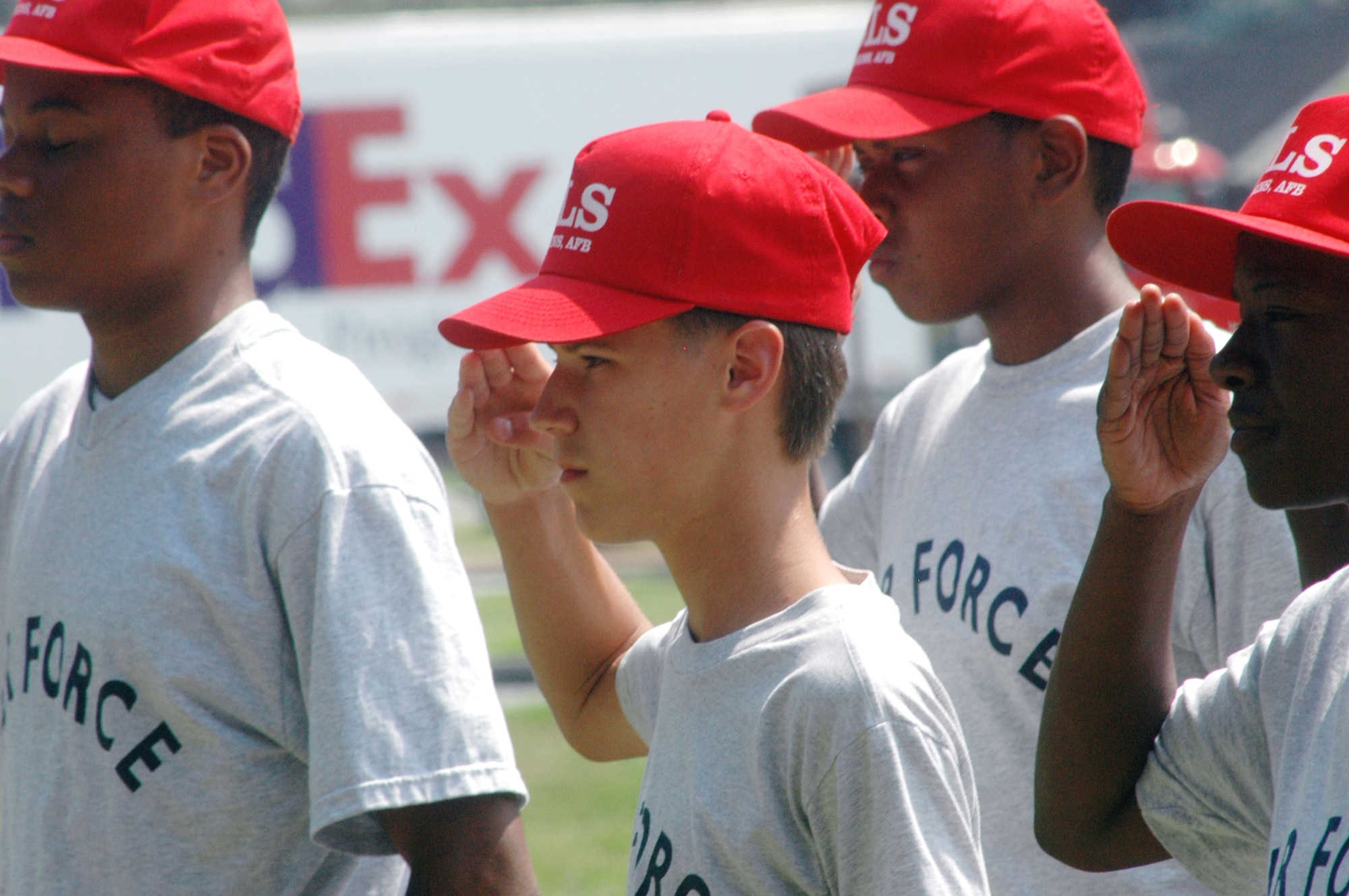 Cadet Justin Green, 10th grade student from Northside High School, salutes during leadership school. U. S. Air Force photo by Sue Sapp 