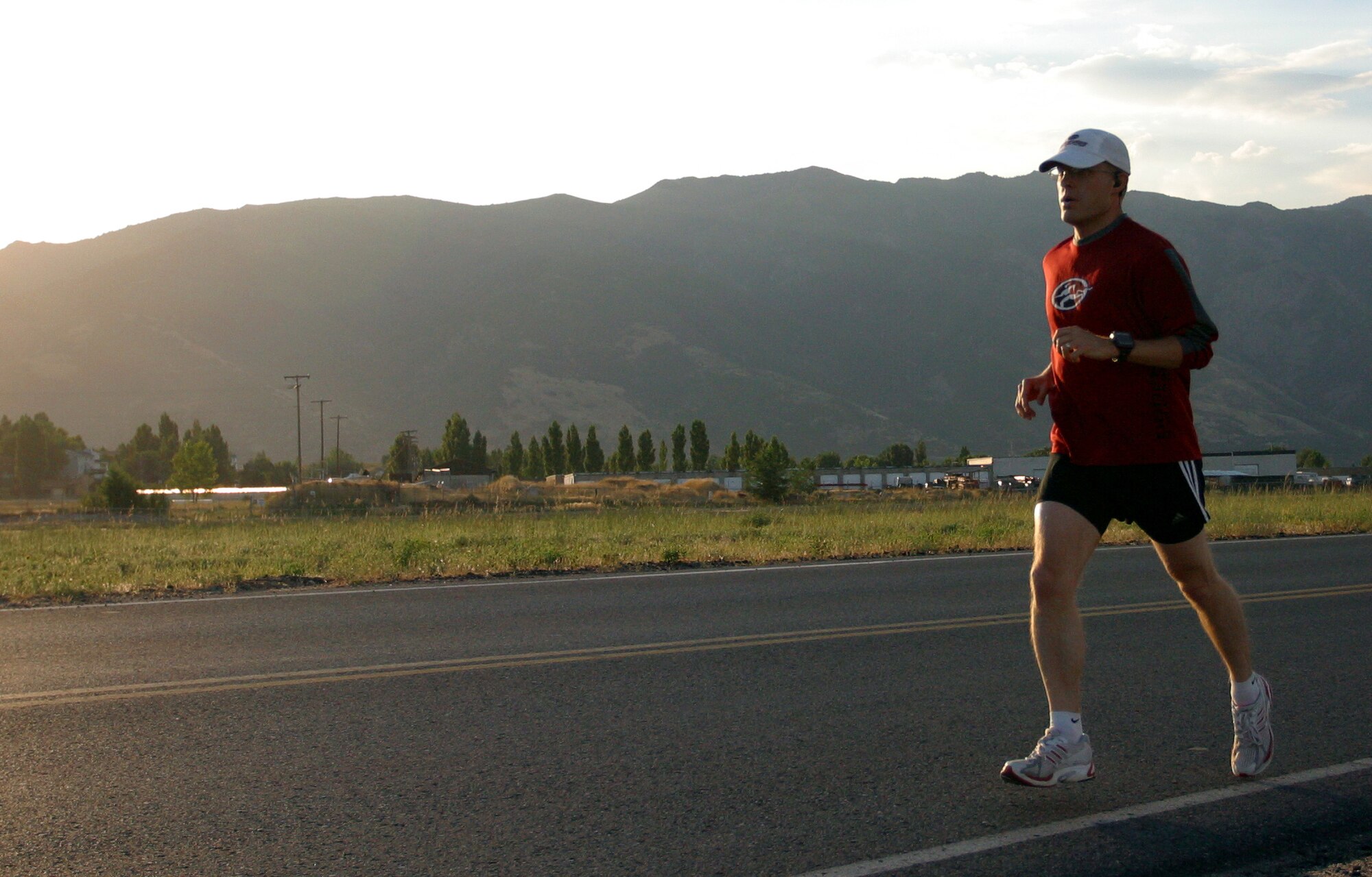 Capt. Harrison in a five mile run before his second marathon event in the "Grand Slam," a four-marathon event that takes place over five months.  "Some wouldn't think running is relaxing, but to me it is," said Captain Harrison. (U.S. Air Force Photo by Senior Airman Daniel Durbin)