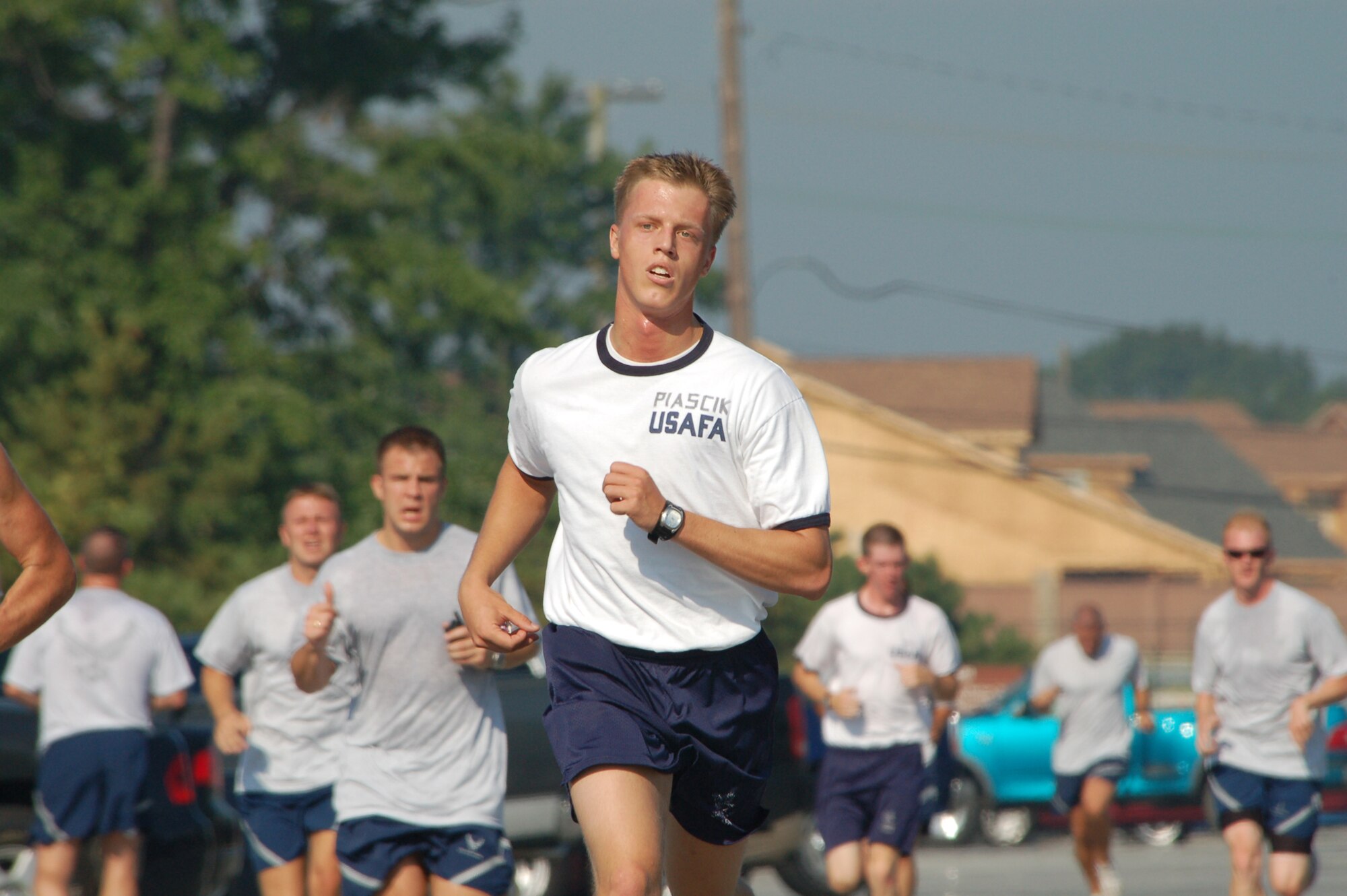 Cadet Ryan Piascik runs with active duty Airmen in Team Dover’s Warrior Run. The cadet is at Dover participating in Operation Air Force and shaddows officers and senior non-commissioned officers during their daily routines. (U.S. Air Force photo/Tech. Sgt. Kevin Wallace)