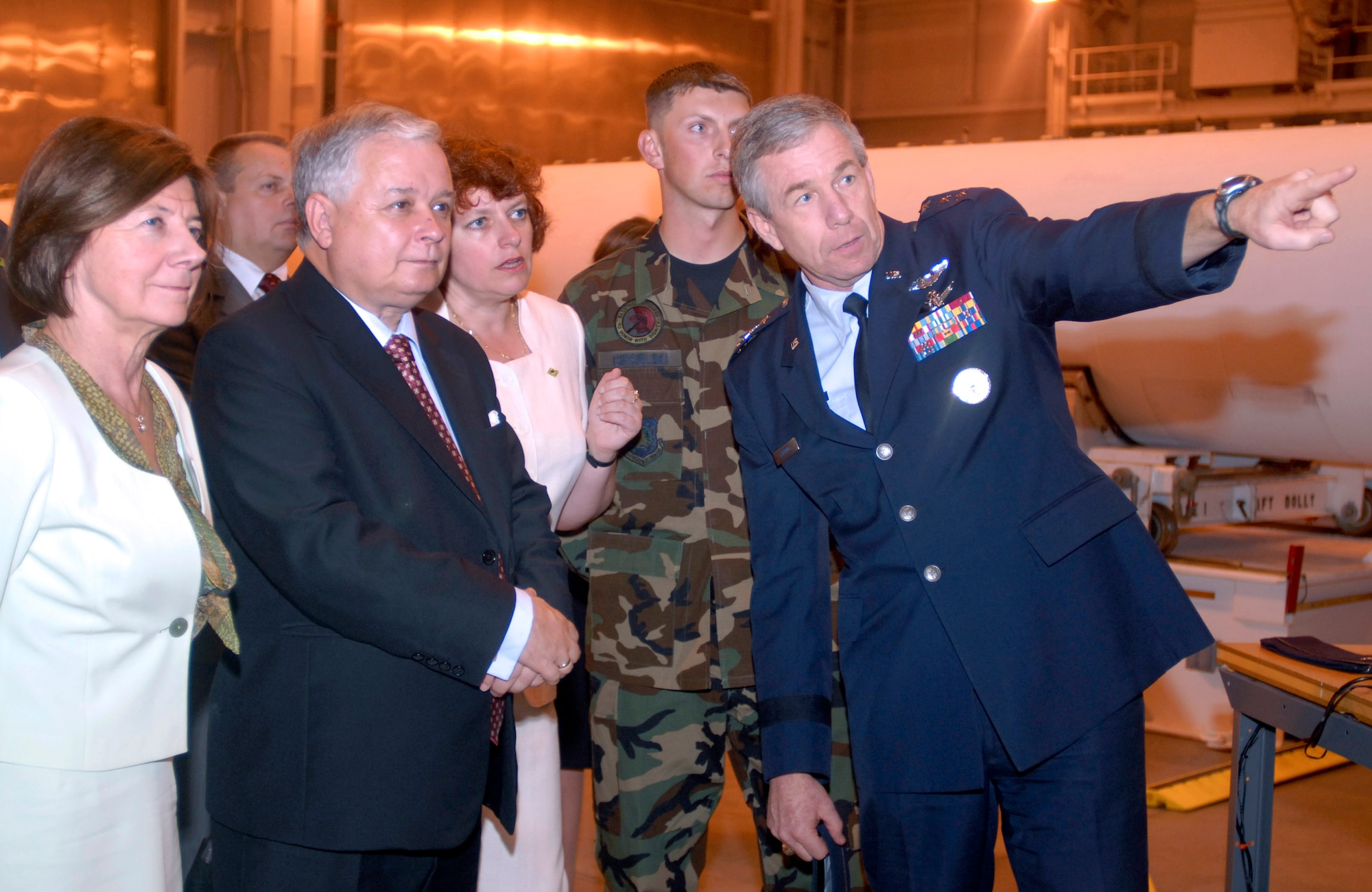 Polish President Lech Kaczynski and his wife, Maria Kaczynski, listen as Lt. Gen. Henry A. Obering III gives a July 18 tour of Vandenberg Air Force Base, Calif. The purpose of the tour was to highlight missile defense facilities located on the base and meet with Missile Defense Agency officials. General Obering is the director of the Missile Defense Agency. (U.S. Air Force photo/Senior Airman Kristi Emler) 
