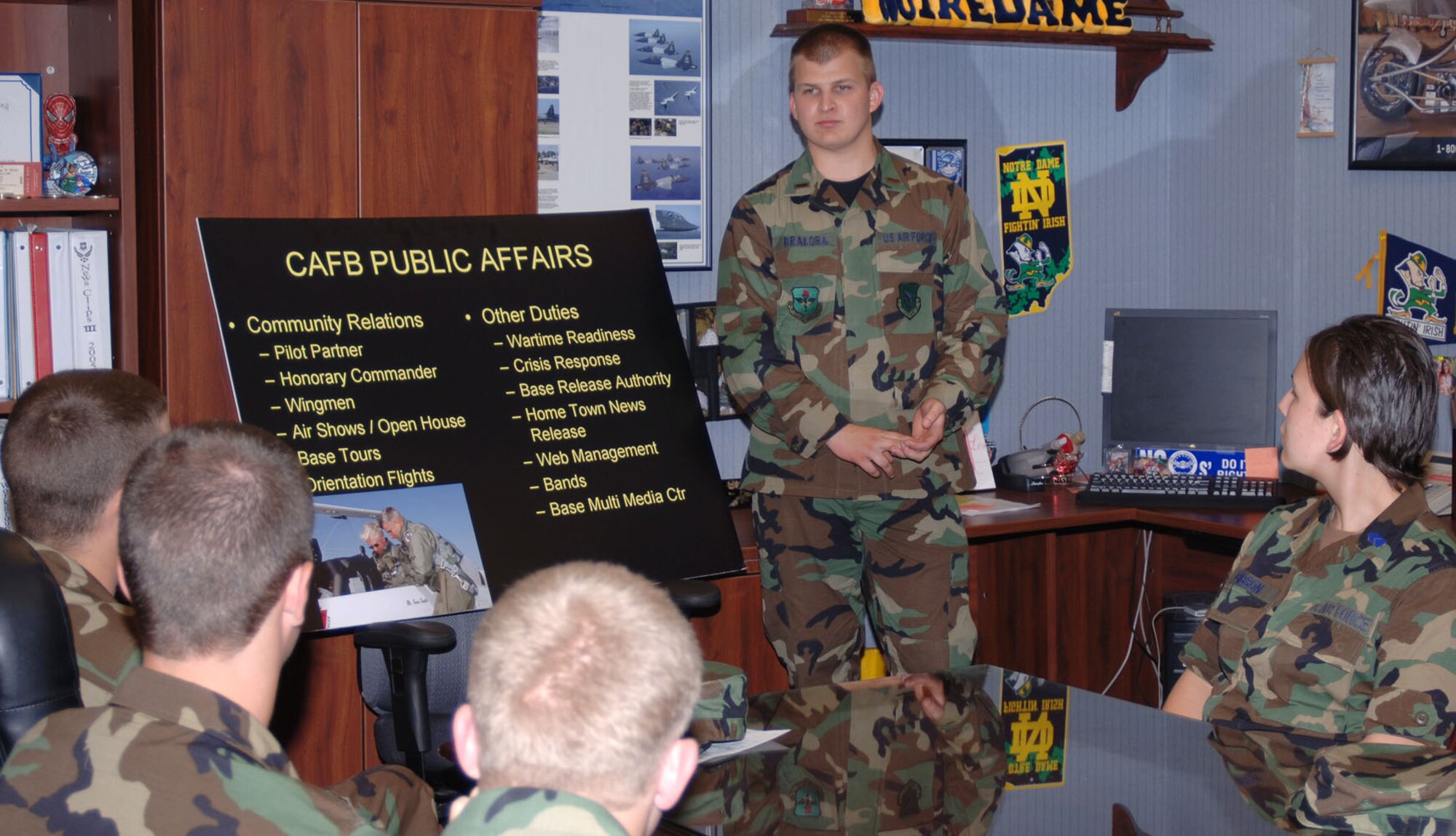 Second Lt. Kenneth Barkora, 14th Flying Training Wing Public Affairs, briefs a group of Operational Air Force cadets Wednesday. The cadets were touring the base to learn about different Air Force careers. During their three-week stay at Columbus AFB, the cadets will also be able to shadow three careers they may want to pursue in the AF and they will see first hand what life is like in the military. (U.S. Air Force Photo by Airman 1st Class Danielle Powell)