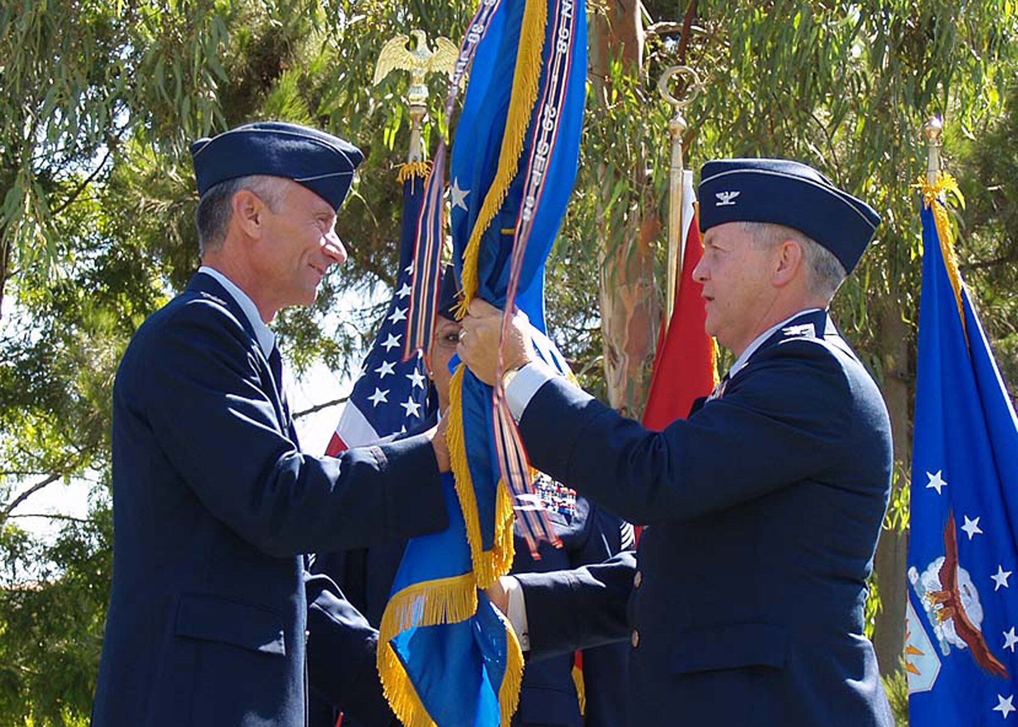 Col. Norman Potter, right, assumes command of the 425th Air Base Group from Col. Philip McDaniel, 39th Air Base Wing commander, on July 16 at the 425th ABG Parade Ground. (U. S. Air Force photo by Tech. Sgt. Vincent Clark)