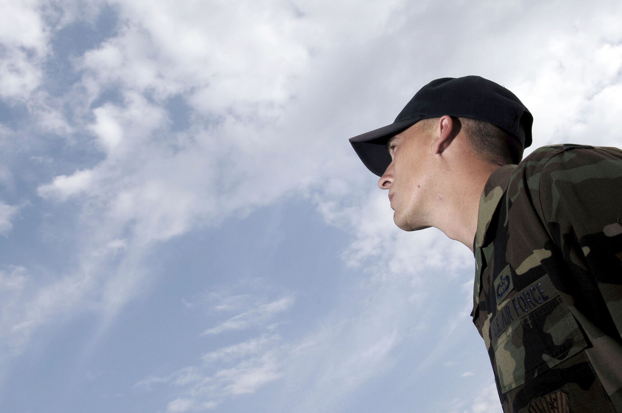 Tech. Sgt Jerrod Webb, 6th Operations Support Squadron Weather Flight, performs hourly surface weather condition checks at MacDill. (U.S. Air Force Photo by Senior Airman Bradley Lail)
