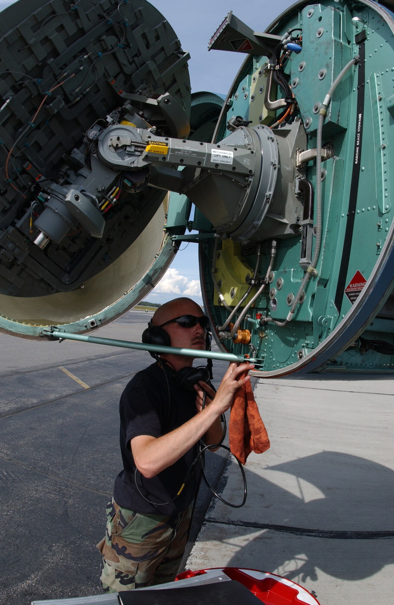 EIELSON AIR FORCE BASE, Alaska -- Senior Airman Joseph Matulka, 57th Aircraft Maintenance Squadron, Nellis Air Force Base, Nev., checks for a leaking hose July 19, 2007. Red Flag-Alaska provides training for deployed maintenance and support personnel in sustainment of a large-force deployed air operation. (U.S. Air Force photo by Airman 1st Class Christopher Griffin)