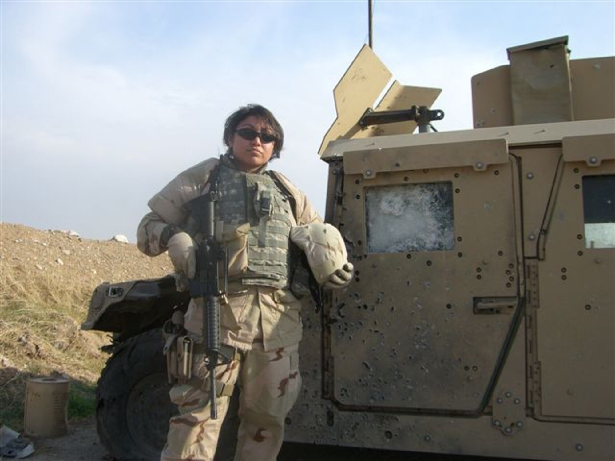 Staff Sgt. Aime Hart, 56th Operations Support Squadron intelligence analyst, pictured here while still in Iraq, will receive a second Purple Heart in a ceremony today.