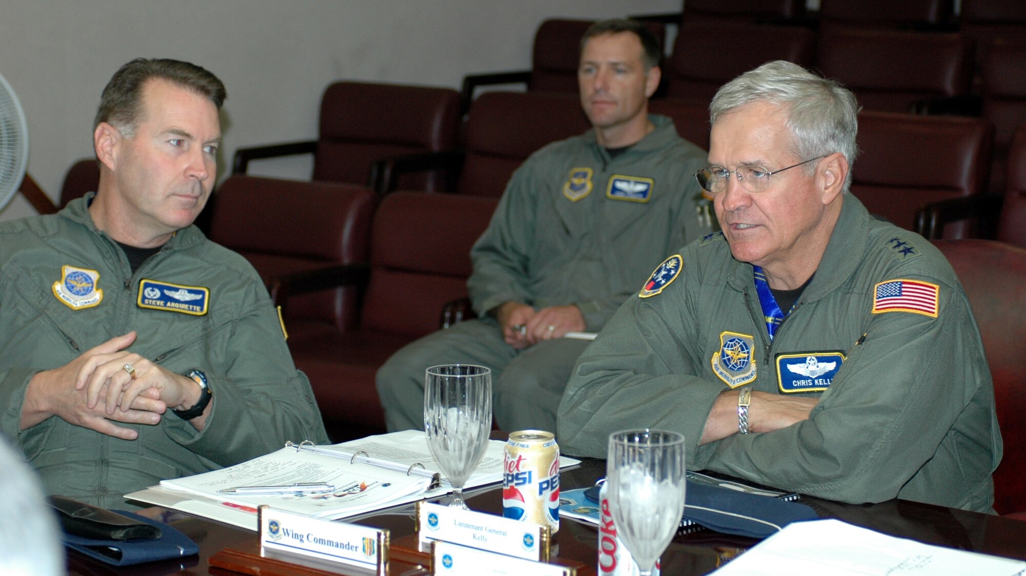 Lt. Gen. Christopher Kelly, (right), Air Mobility Command vice commander discusses the importance of the Air Force Voluntary Protection Program as Col. Steve Arquiette, (left), 60th Air Mobility Wing commander, listens in. During his short visit July 18, General Kelly emphasized to unit commanders and safety staff the importance of using the industry-proven principles of VPP to reduce preventable mishaps in the Air Force. (U.S. Air Force photo/Staff Sgt. Candy Knight) 