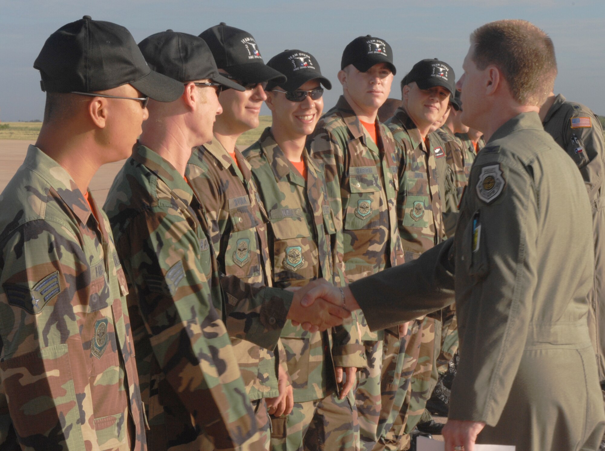 DYESS AIR FORCE BASE,Texas -- Colonel Kevin Jackson,  317th Airlift Group commander, bids farewell and goodluck to the Dyess Air Mobility Command Rodeo Team as they depart for  McChord AFB, Wash., July 20. The Rodeo Team will compete against 33 different teams from all around the world. (U.S. Air Force photo by Airman 1st Class Jennifer Romig)