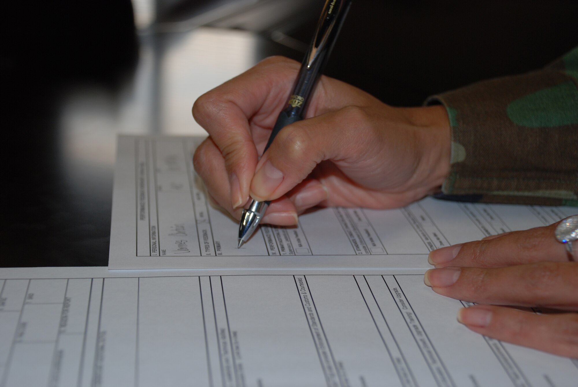 Recently the Air Force released changes to the enlisted and officer performance reports, including the inclusion of fitness scores, digital signatures, and a signature from the ratee. (U.S. Air Force photo/John Ingle)