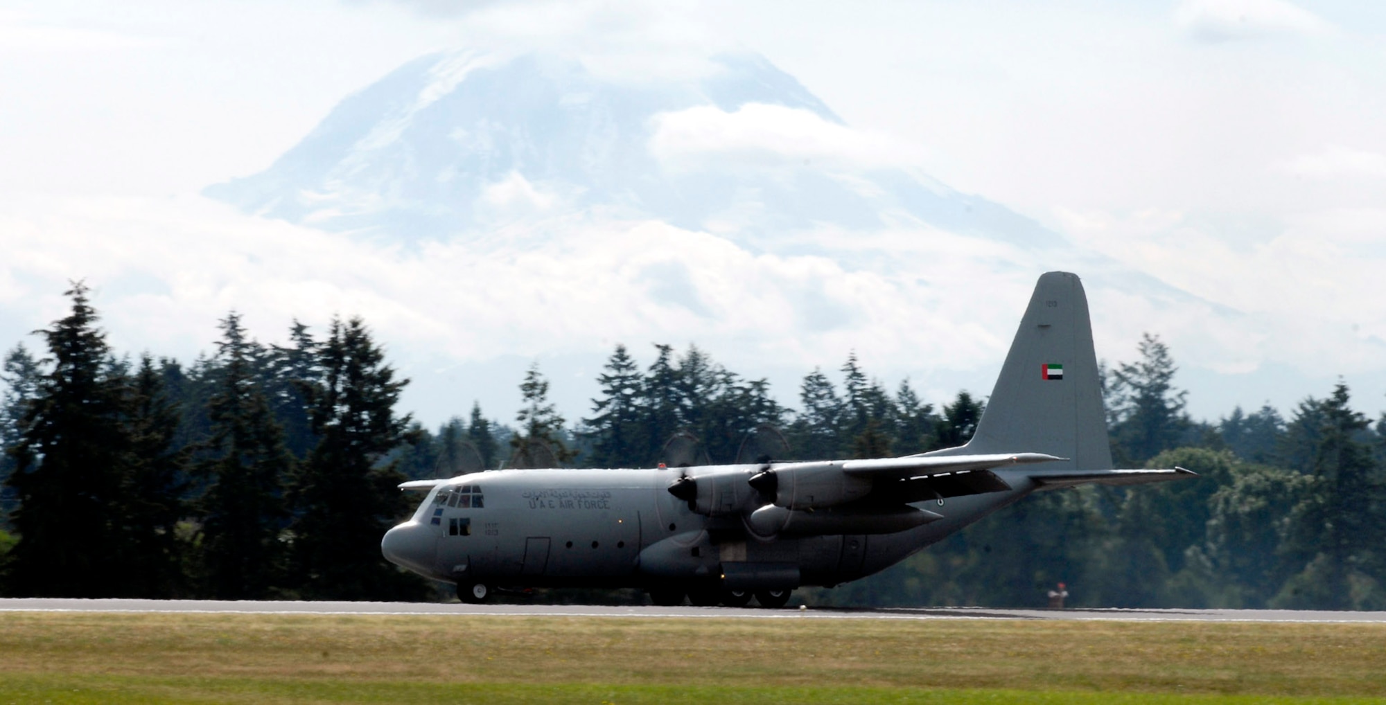 A United Arab Emirates air force C-130 arrives at McChord Air Force Base, Wash., July 16 for Air Mobility Command's Rodeo 2007.  The event is a readiness competition for U.S. and international mobility air forces. It focuses on improving warfighting capabilities and support of the war on terrorism. (U.S. Air Force photo/Airman Jonathan Olds) 