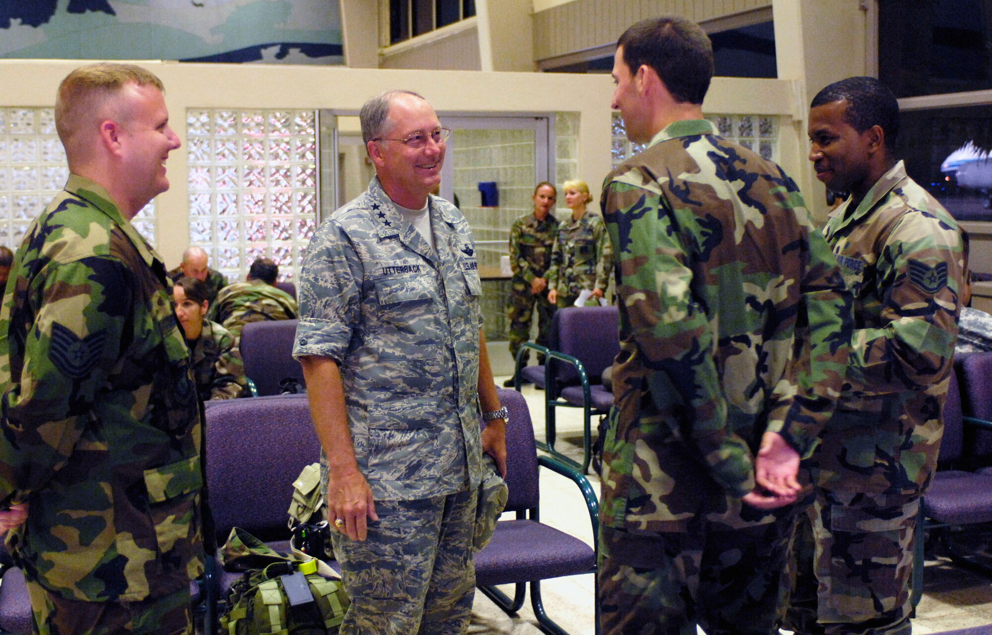 Lt. Gen. Loyd S. Utterback speaks to medics prior to them leaving for a humanitarian mission July 20 at the passenger terminal on Hickam Air Force Base, Hawaii. Approximately 50 Airmen, Soldiers and Sailors will travel to Vanuatu, Kiribati and Nauru to provide medical, dental and engineering support to the residents of the Pacific islands. General Utterback is the 13th Air Force commander. (U.S. Air Force photo/Tech. Sgt. Shane A. Cuomo) 
