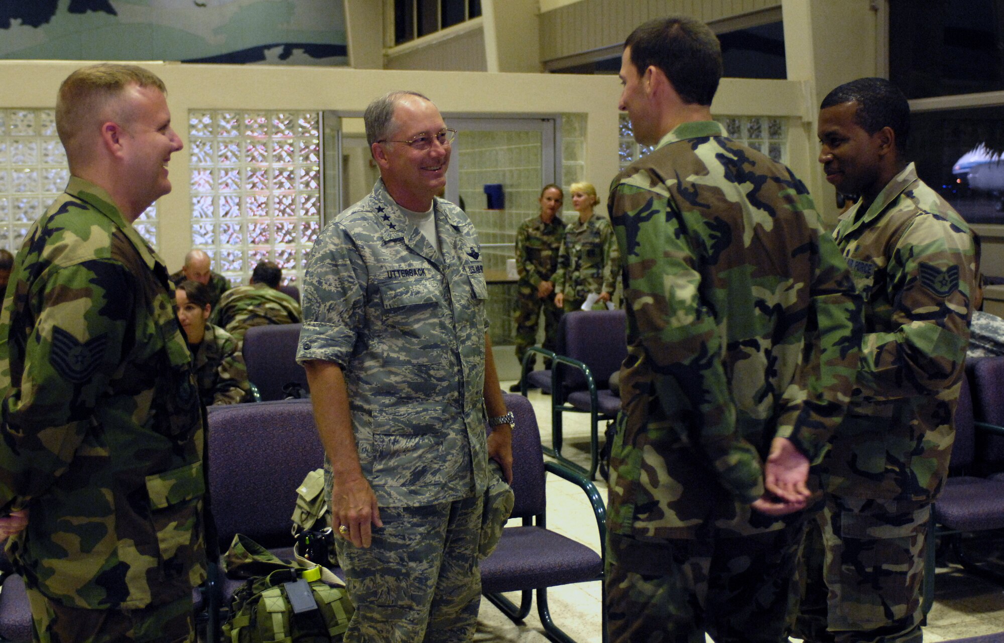 HICKAM AIR FORCE BASE, Hawaii -- Lt. Gen. Chip Utterback, 13th Air Force commander, speaks to medical personnel at the passenger terminal here prior to their departure for a humanitarian mission July 20. Approximately 50 Air Force, Army and Navy personnel are traveling to Vanuatu, Kiribati and Nauru to provide medical, dental and engineering support to the local residents. (U.S. Air Force photo/Tech. Sgt. Shane A. Cuomo)