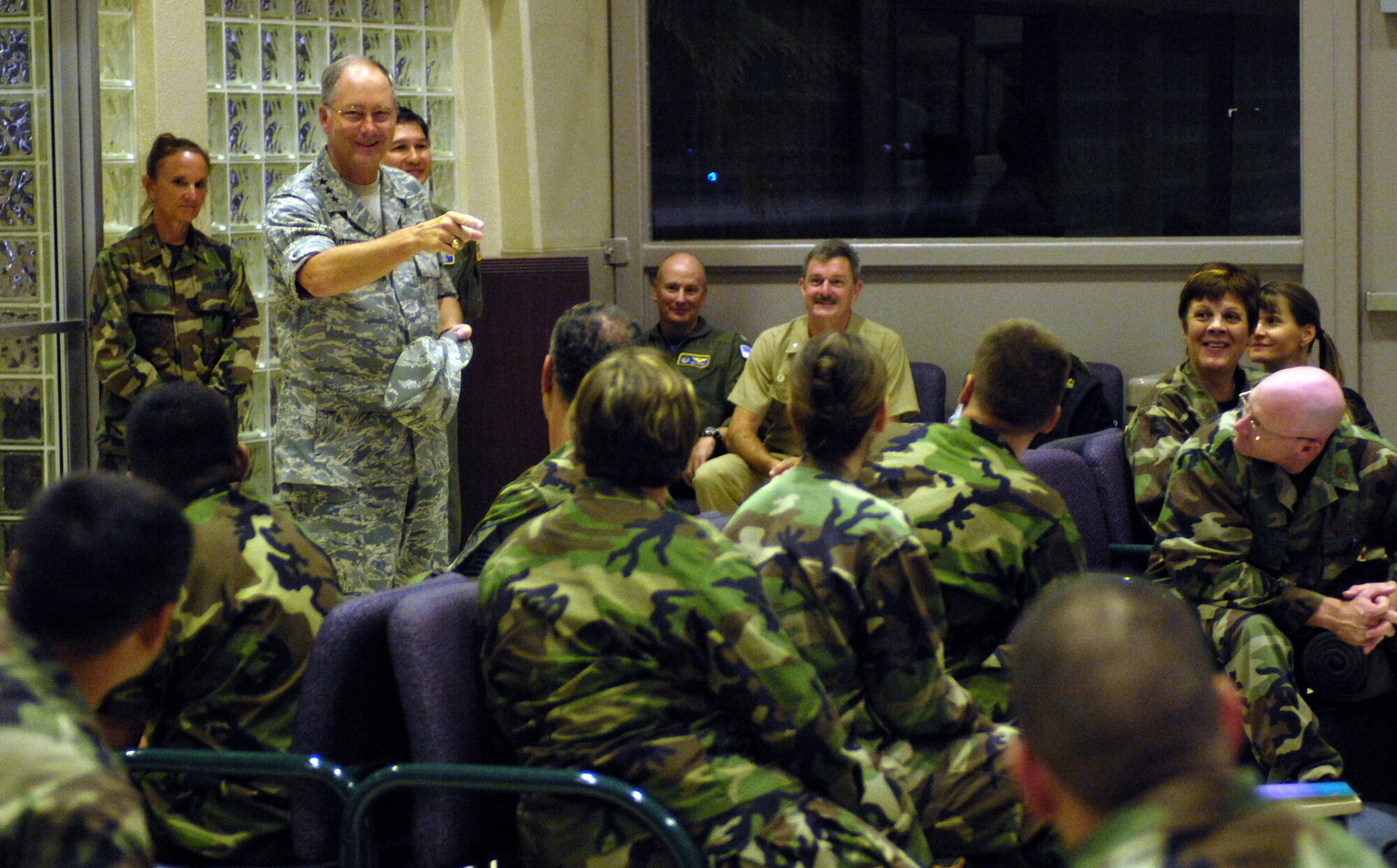 HICKAM AIR FORCE BASE, Hawaii -- Lt. Gen. Chip Utterback, 13th Air Force commander, speaks to medical personnel at the passenger terminal here prior to their departure for a humanitarian mission July 20. Approximately 50 Air Force, Army and Navy personnel are traveling to Vanuatu, Kiribati and Nauru to provide medical, dental and engineering support to the local residents. (U.S. Air Force photo/Tech. Sgt. Shane A. Cuomo)