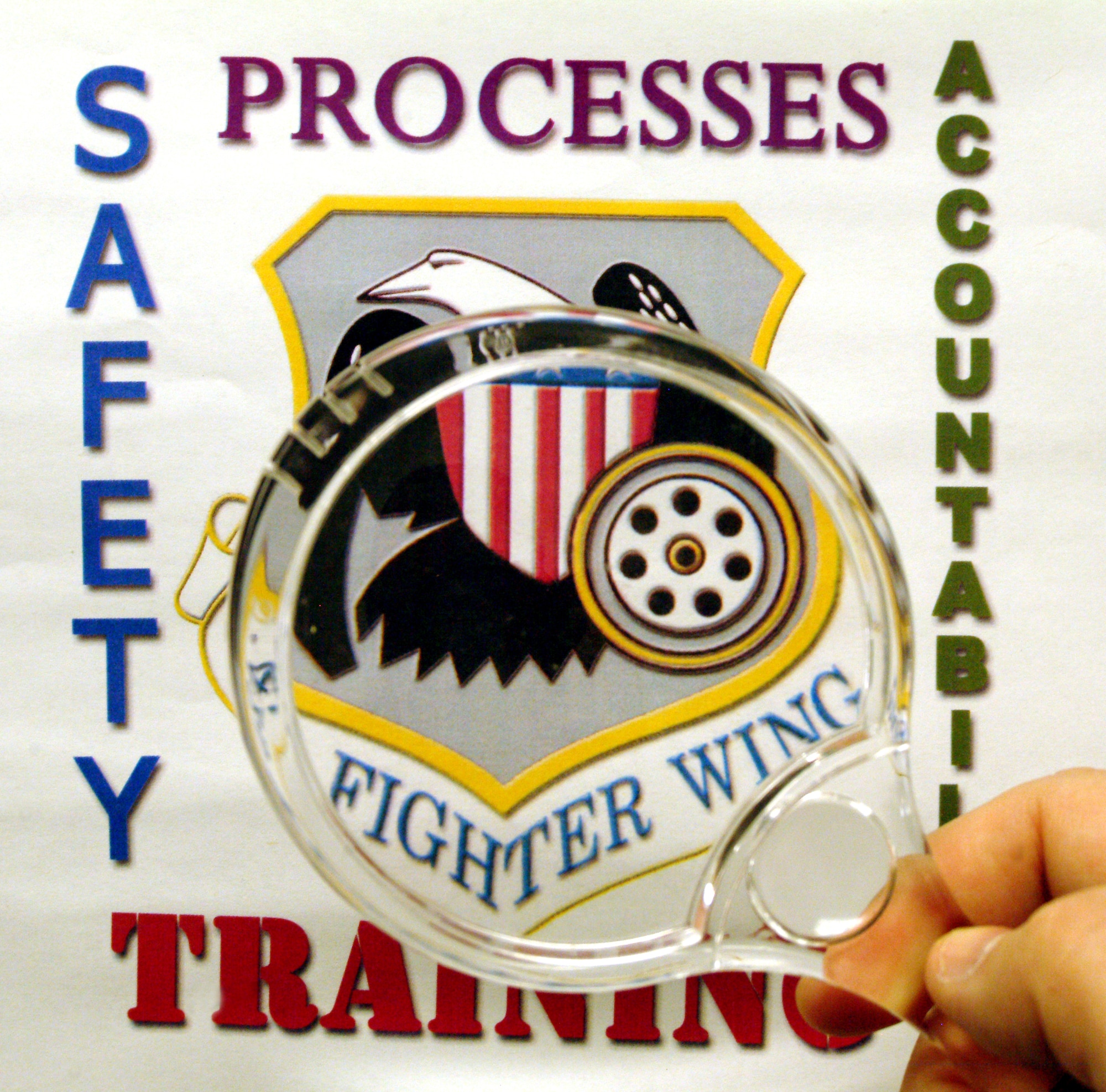 Starting July 31, a team of inspectors from Air Force Reserve Command will put the 442nd Fighter Wing under its magnifying glass while conducting a unit compliance inspection.  (Photo illustration/Maj. David Kurle)