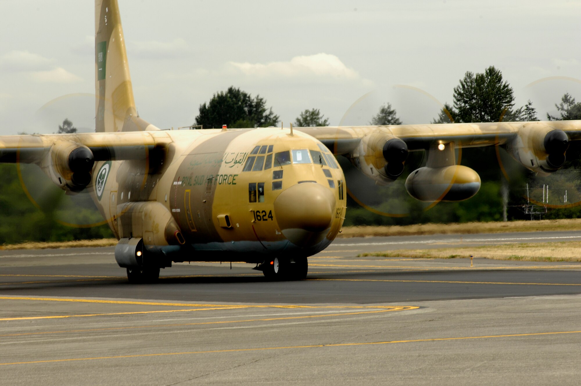A C-130 from Saudi Arabia taxis after its arrival to McChord Air Force Base, Wash., on July 16 before the AMC Rodeo competition begins. Rodeo 2007, hosted by Air Mobility Command, is a readiness competition of U.S. and international mobility air forces.  It focuses on improving warfighting capabilities and support of the Global War on Terrorism.  (U.S. Air Force Photo/Airman Jonathan Olds) 