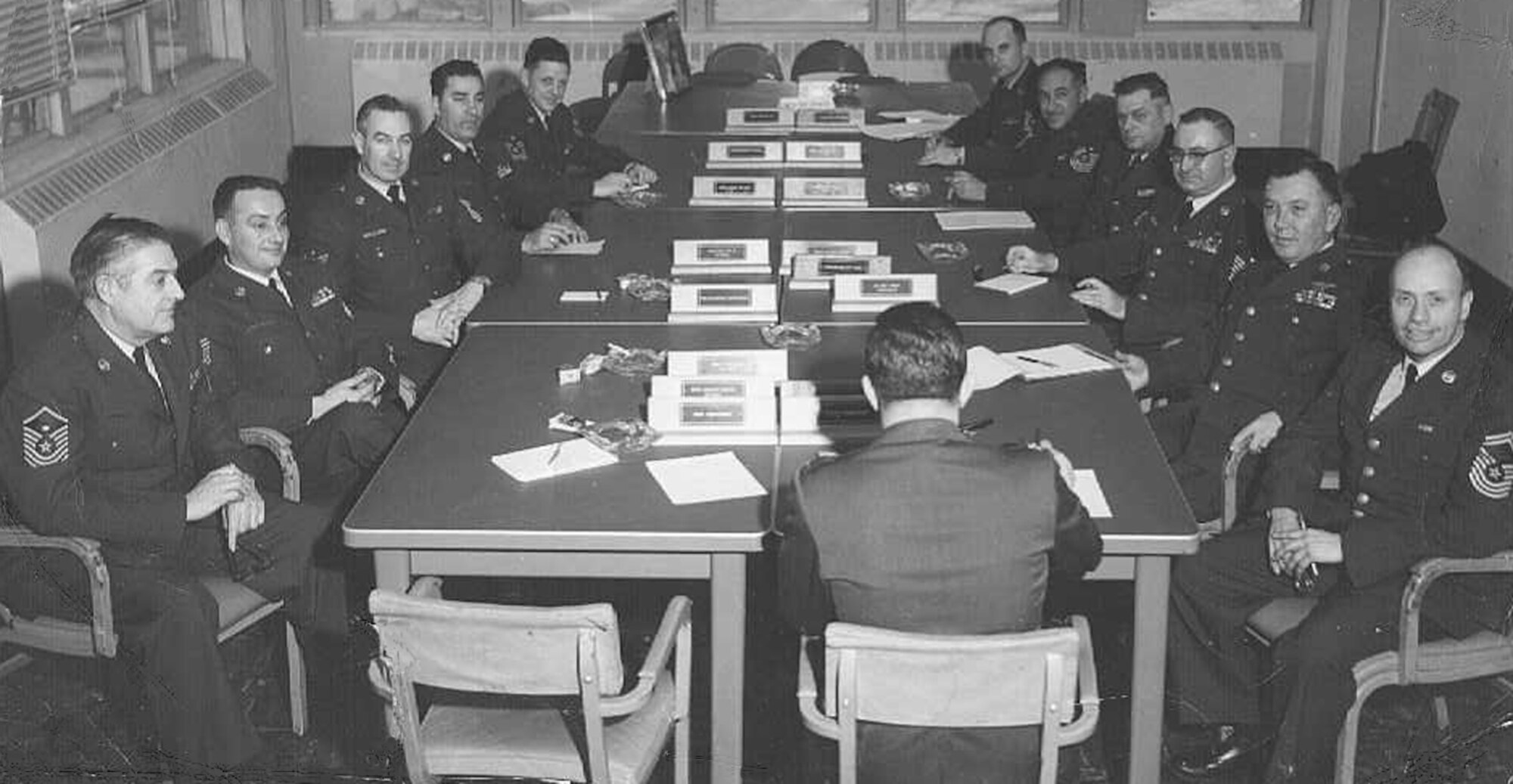 HANSCOM AFB, Mass., -- Top, front right, Chief Master Sgt. Arthur Snow, then a senior master sergeant, attends a 94th Military Airlift Wing conference at Hanscom. (Courtesy Photo)