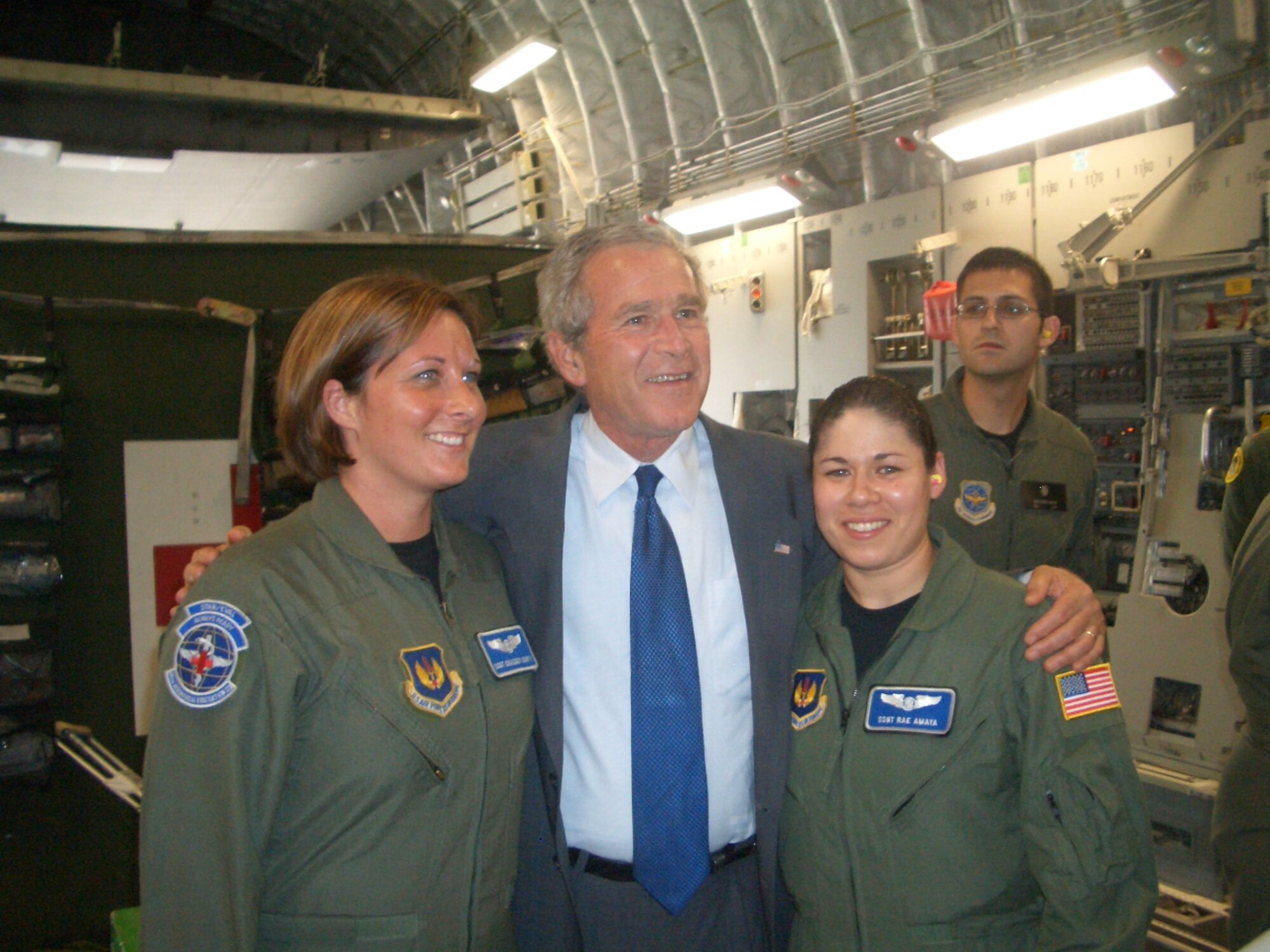 President George W. Bush thanked Staff Sgts. Chassidy Dority and Raelene Amaya, 86th Aeromedical Evacuation Squadron, for their service to their country July 10. (U.S. Air Force Photo/86th Airlift Wing)

