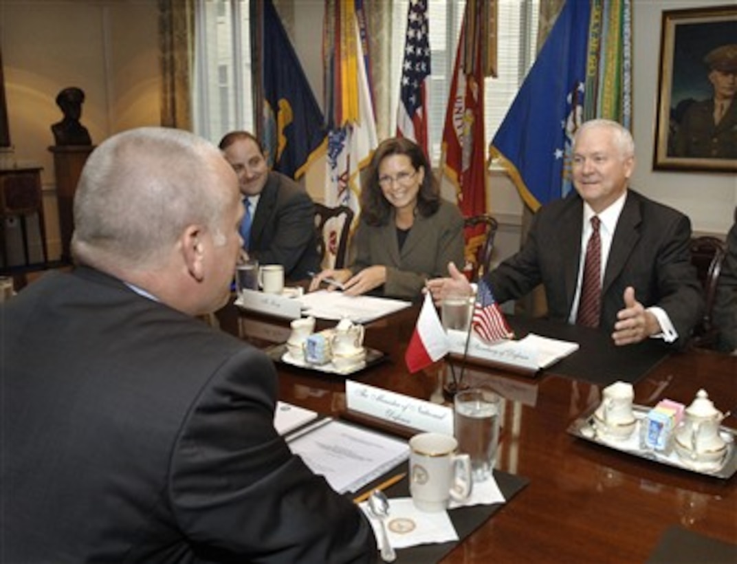 Secretary of Defense Robert M. Gates (right) hosts a Pentagon meeting with Polish Minister of National Defense Aleksander Szczyglo (left) to discuss a variety of bilateral security issues on July 16, 2007.  Participating in the talks are Deputy Assistant Secretary of Defense for Defense Forces Policy Brian Gren (3rd from right) and Acting Assistant Secretary of Defense for International Security Affairs Mary Beth Long (2nd from right).  