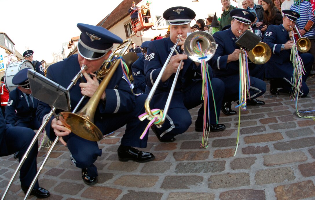 The USAFE Cerimonial Band adding some flare to the annual Fasching parade in Ramstein village, Germany.  No performance in Germany is complete without a rendering of In the Mood