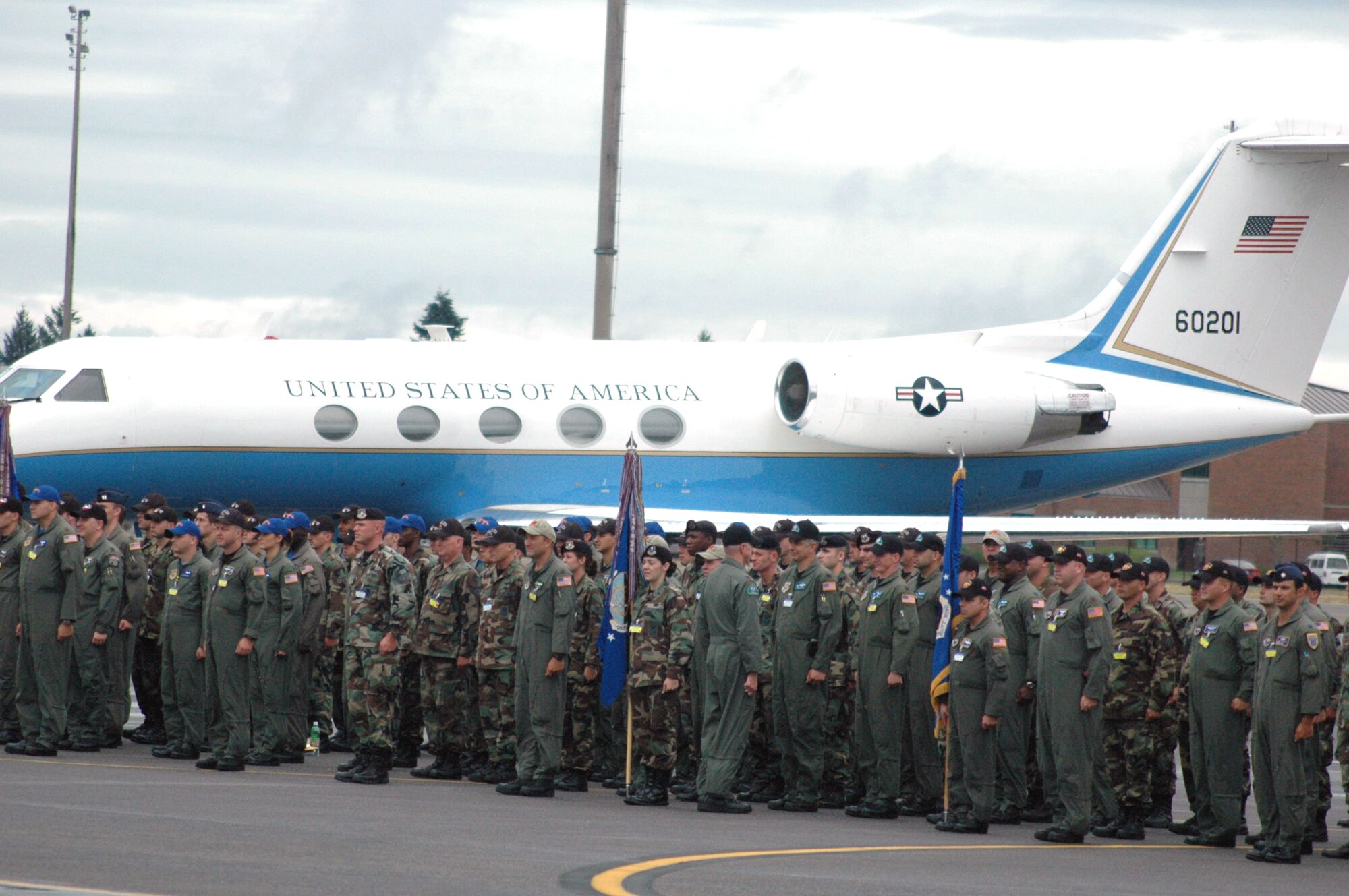 Teams for Air Mobility Rodeo 2007 stand in formation during the opening ceremony July 22 at McChord Air Force Base, Wash.  Rodeo, sponsored by Air Mobility Command, is a readiness competition for U.S. and international mobility air forces.  (U.S. Air Force photo/Tech. Sgt. Scott T. Sturkol)