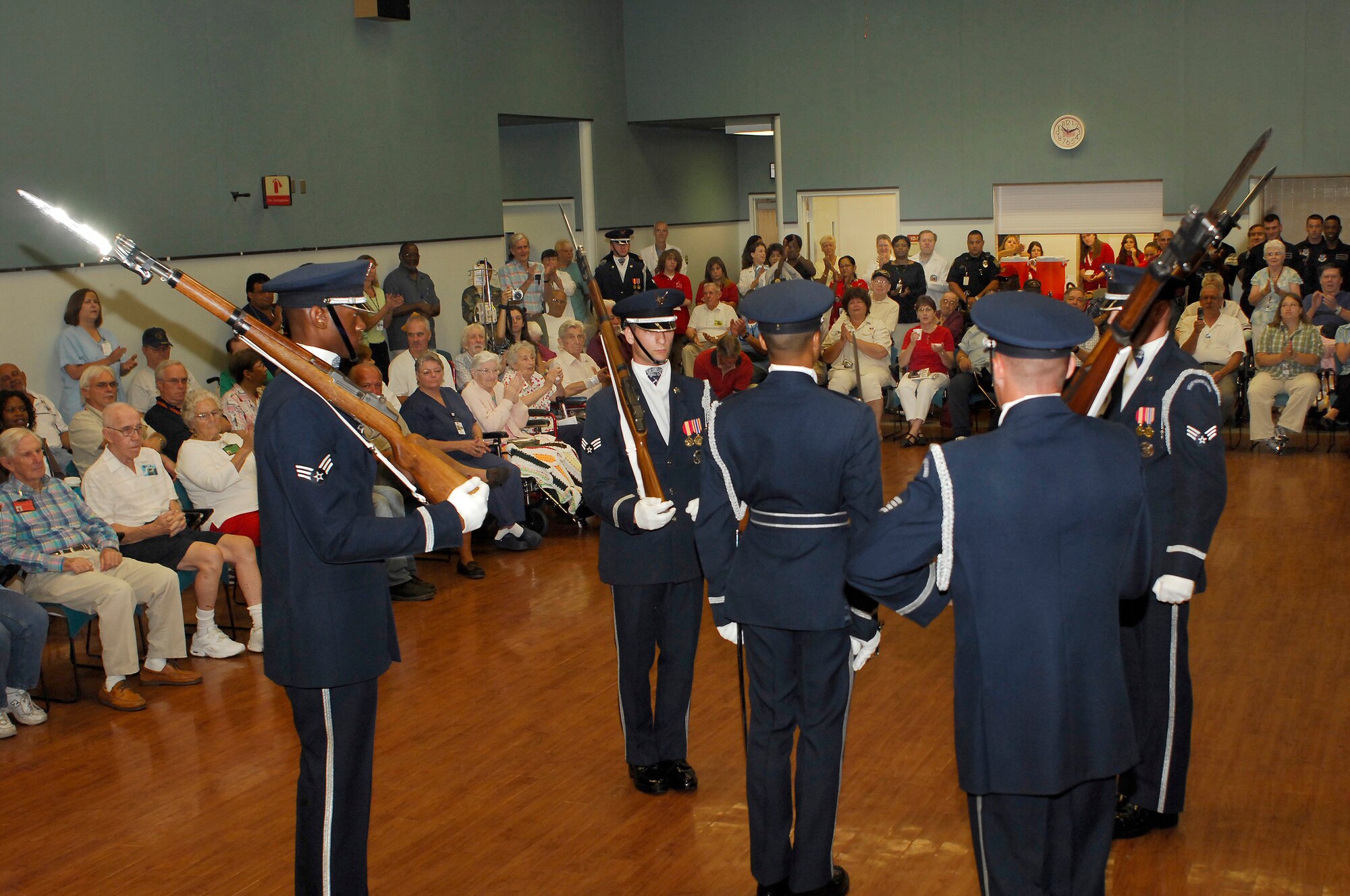 07/10/07 - BAY PINES, Fla.--The AF Honor Guard Drill Team spent the day with residents of the Bay Pines VA Hospital near MacDill AFB, Fla.  The Drill Team was joined by members of the MacDill Base Honor Guard.  VA Hospital coordinators said "...the residents will be talking about this through the Winter."  The Airmen spent time learning of the heritage built in the Air Force, as well as the Army, Navy and Marines, by the men & women now residing at the VA hospital.  (U.S. Air Force photo by Airman 1st Class Alexandre Montes)