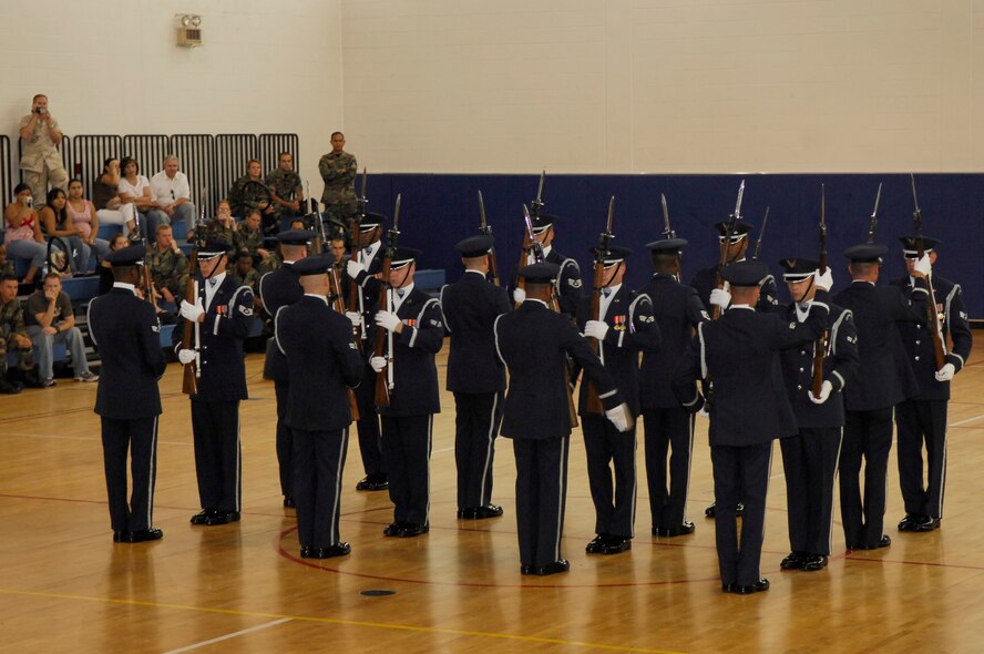 MACDILL AFB, Fla.--07/09/07--The AF Honor Guard Drill Team visited MacDill AFB, Fla. for two days.  More than 500 base members attended the Team's two troop morale performances which were open to the base and the community.  The Drill Team is the traveling component of the Air Force Honor Guard and tours Air Force bases world wide showcasing the precision of today's Air Force to recruit, retain, and inspire Airmen for the Air Force mission. (U.S. Air Force photo by Airman 1st Class Alexandre Montes)