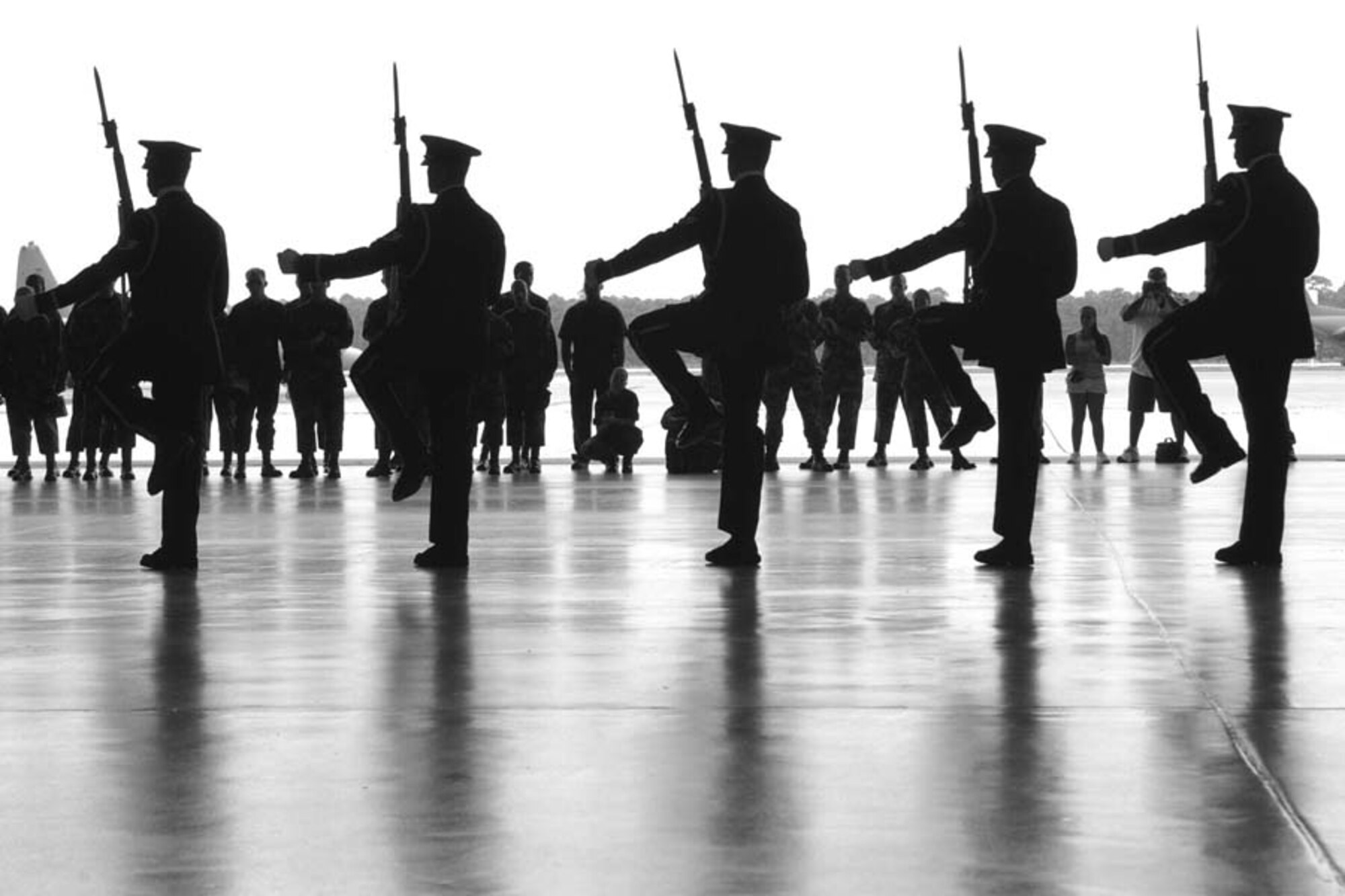 Air Force Honor Guard drill teams show Team Hurlburt how its done. Photo by Senior Airman Gary Stevens.