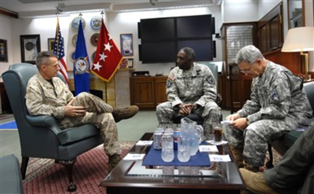 From left to right, Chairman of the Joint Chiefs of Staff U.S. Marine Gen. Peter Pace, nominated U.S. Africa Command Commander Gen. William Ward, and U.S. European Command Commander Gen. Bantz Craddock, have a meeting at U.S. European Command headquarters in Stuttgart, Germany, July 20, 2007.   