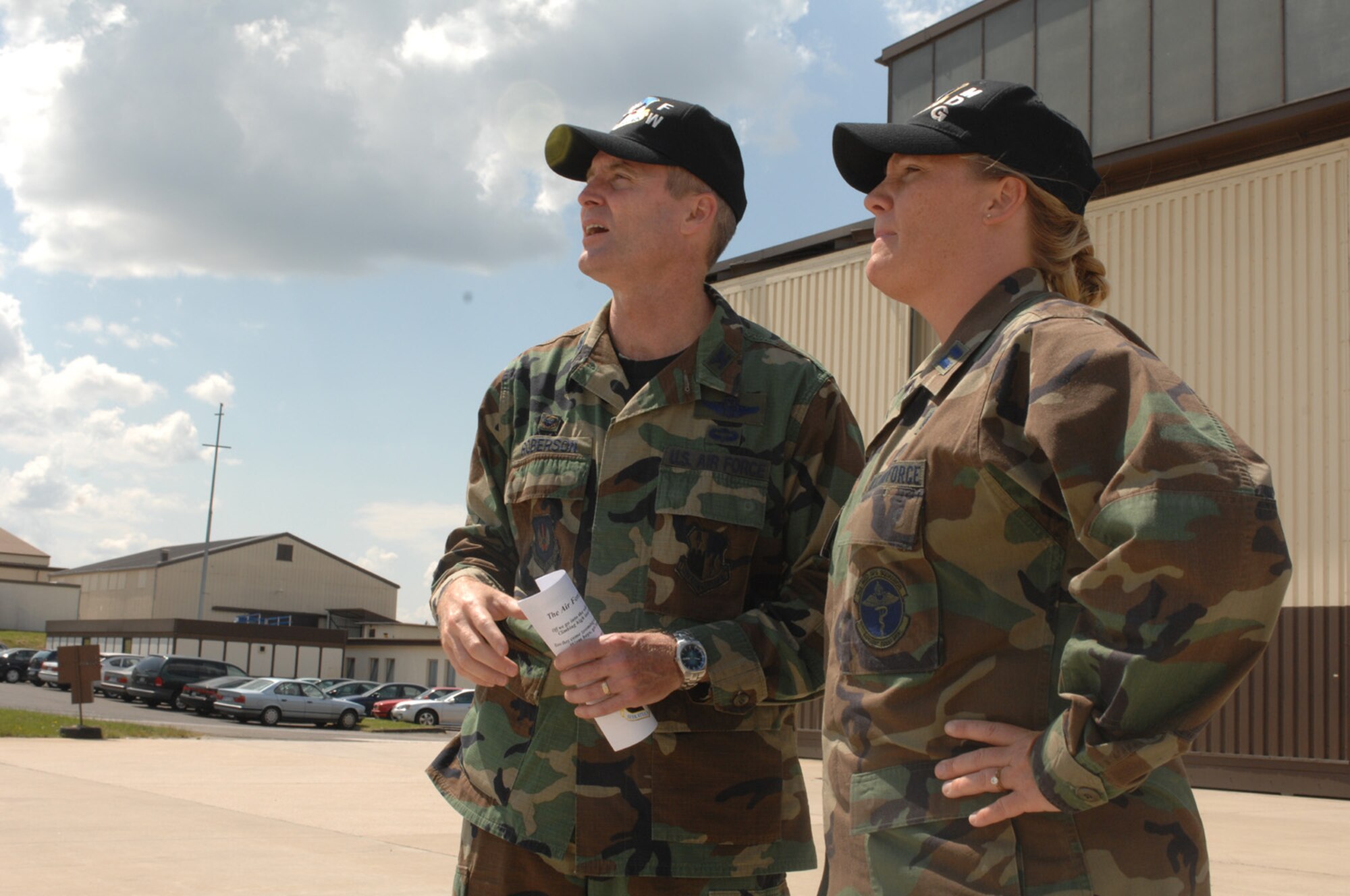 SPANGDAHLEM AIR BASE, Germany -- Col. Darryl Roberson, 52nd Fighter Wing commander, discusses recent developments taking place on base with Capt. Jeannie Berry, 52nd Medical Operations Squadron, as she shadows the commander July 18. Captain Berry a nurse manager at the pediatric clinic assists in planning, providing and evaluating patient care and teaching. (U.S. Air Force photo/Airman 1st Class Stephanie Clark)                             