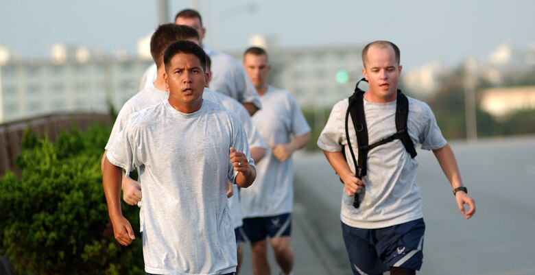Students from Airmen Leadership School run beside Douglas Boulevard early in the morning July 20.
U.S. Air Force photo/Staff Sgt. Reynaldo Ramon