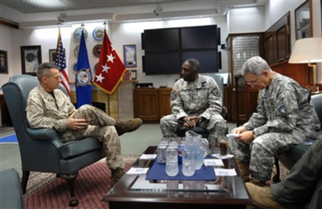 Chairman of the Joint Chiefs of Staff Gen. Peter Pace (left), U.S. Marine Corps, meets with Gen. William Ward (center), U.S. Army, and Commander, U.S. European Command Gen. Bantz Craddock, U.S. Army, at US European Command headquarters in Stuttgart, Germany on July 20, 2007.  Pace is in Germany to visit recovering soldiers at Landstuhl Regional Medical Center and meet troops stationed in Germany.  Ward, who is the deputy commander of the U.S. European Command, has been nominated to become the first commander of U.S. Africa Command.  